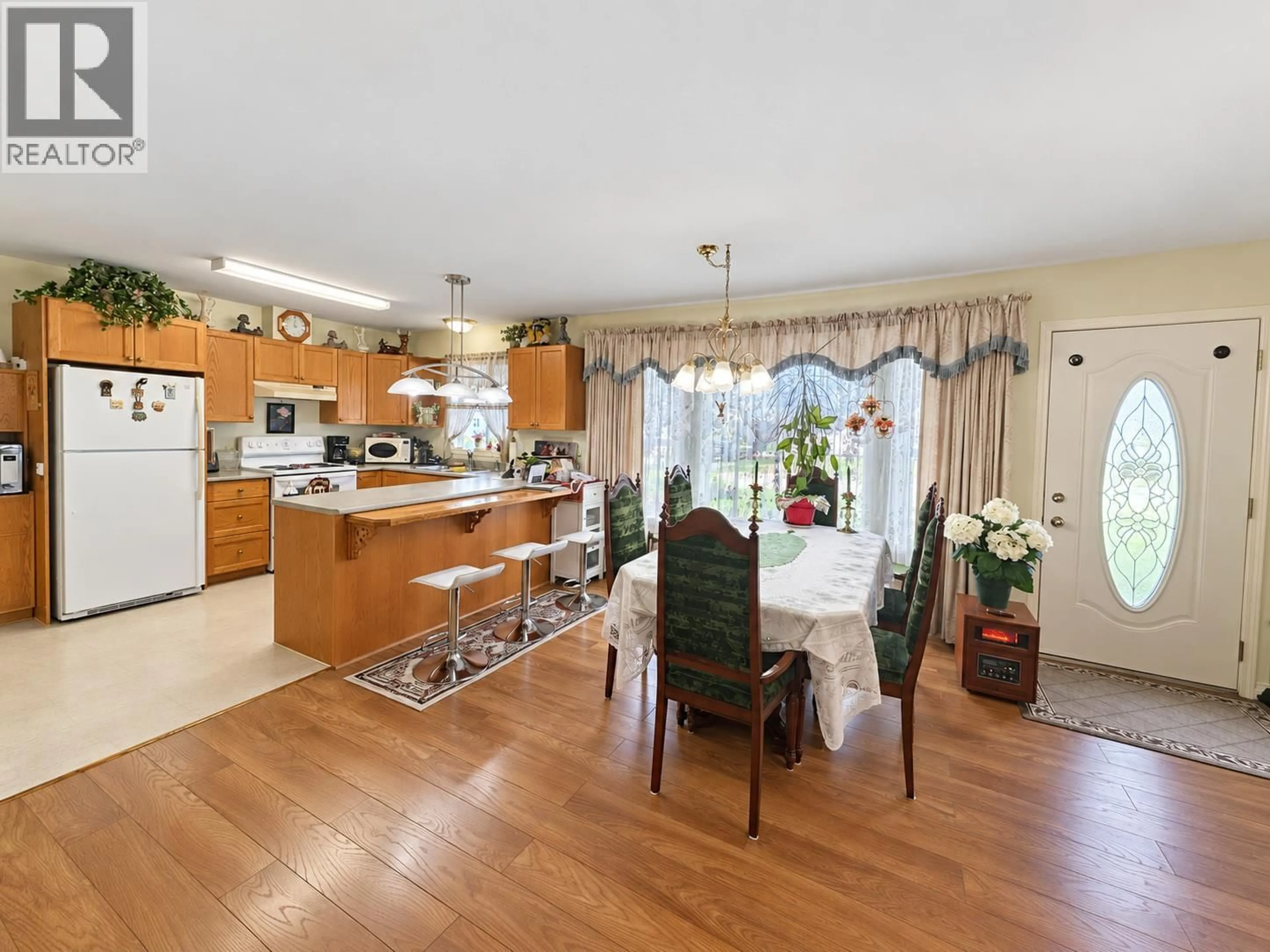 Open concept kitchen, wood/laminate floor for 396 ROBIN DRIVE, Barriere British Columbia V0E1E0