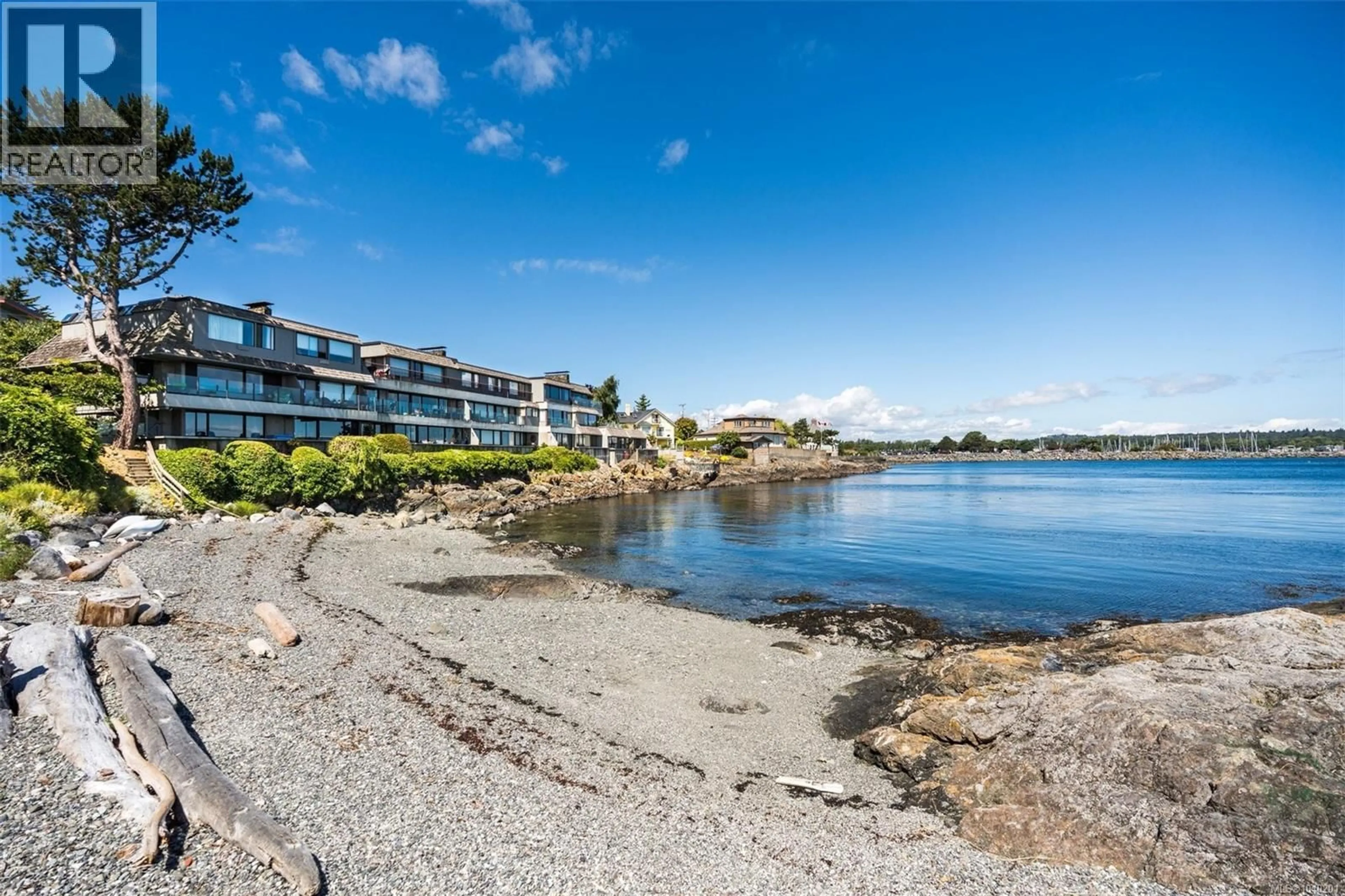 A pic from outside/outdoor area/front of a property/back of a property/a pic from drone, water/lake/river/ocean view for 103 - 1211 BEACH DRIVE, Oak Bay British Columbia V8S2N4