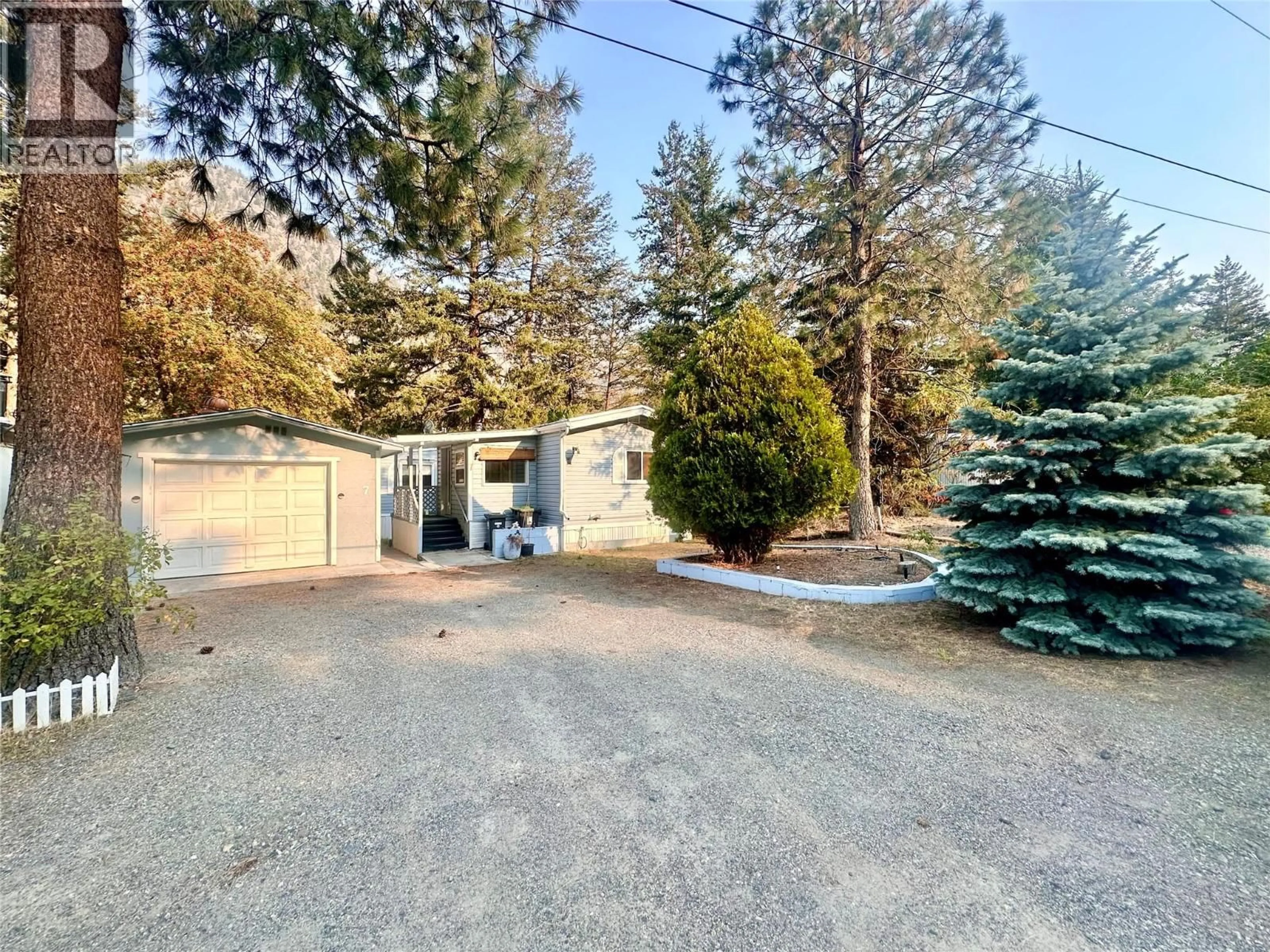 A pic from outside/outdoor area/front of a property/back of a property/a pic from drone, street for 7 - 1514 3A HIGHWAY, Keremeos British Columbia V0X1N6