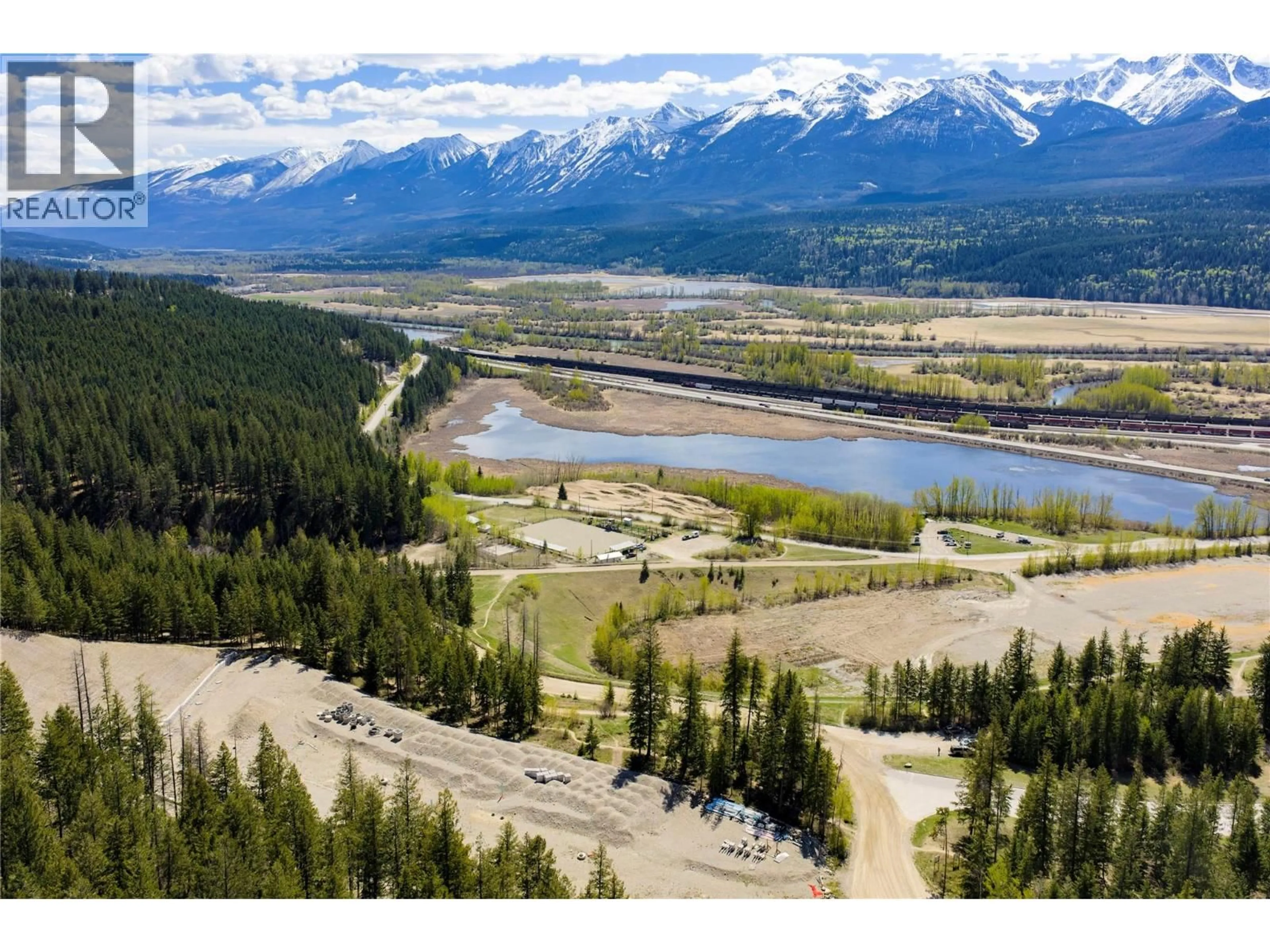 A pic from outside/outdoor area/front of a property/back of a property/a pic from drone, mountain view for 30 - 1551 BOWLE-EVANS DRIVE, Golden British Columbia V0A1H6
