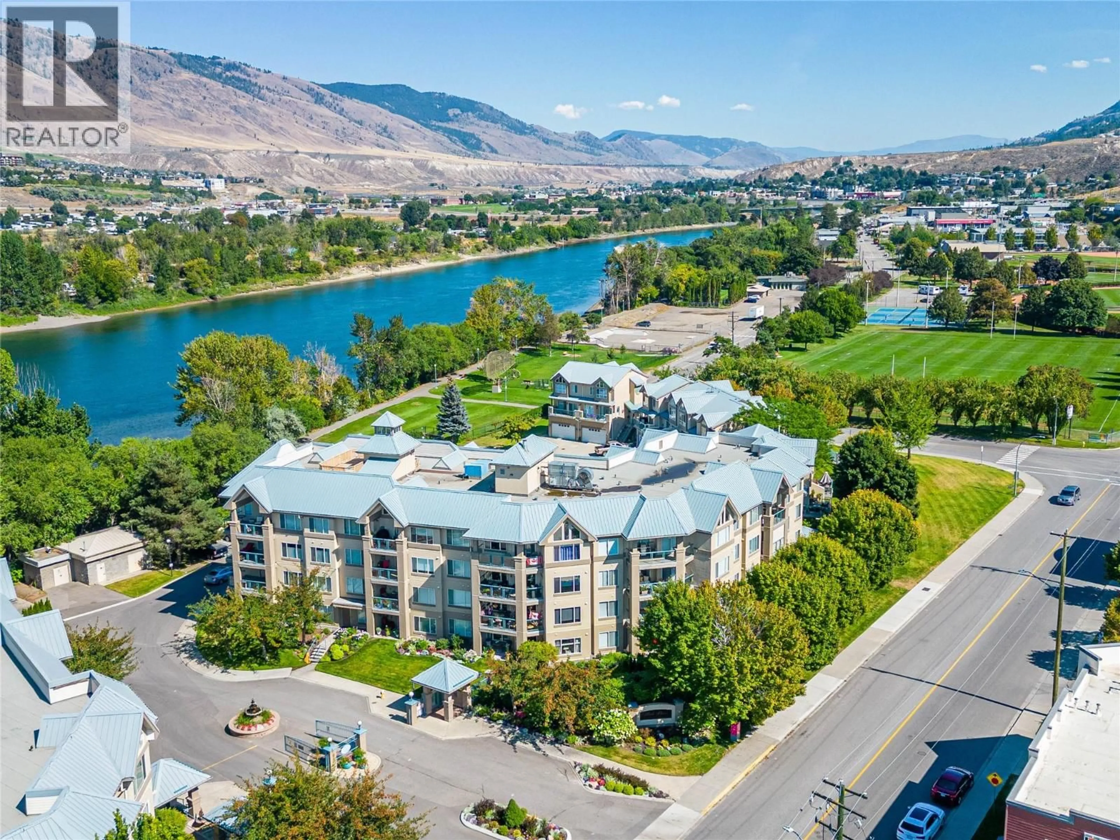A pic from outside/outdoor area/front of a property/back of a property/a pic from drone, water/lake/river/ocean view for 405 - 970 LORNE STREET, Kamloops British Columbia V2C1W9