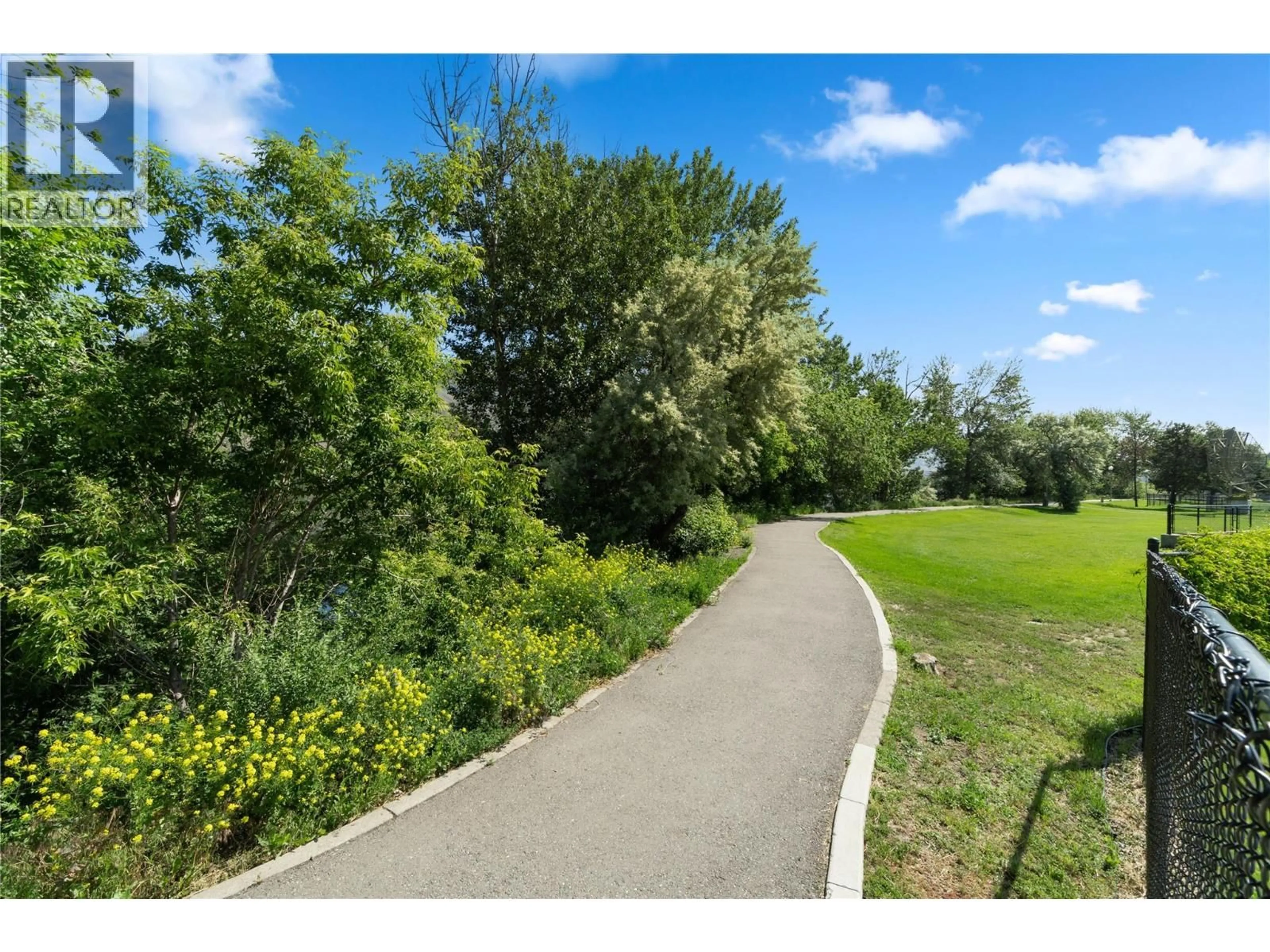 A pic from outside/outdoor area/front of a property/back of a property/a pic from drone, water/lake/river/ocean view for 405 - 970 LORNE STREET, Kamloops British Columbia V2C1W9