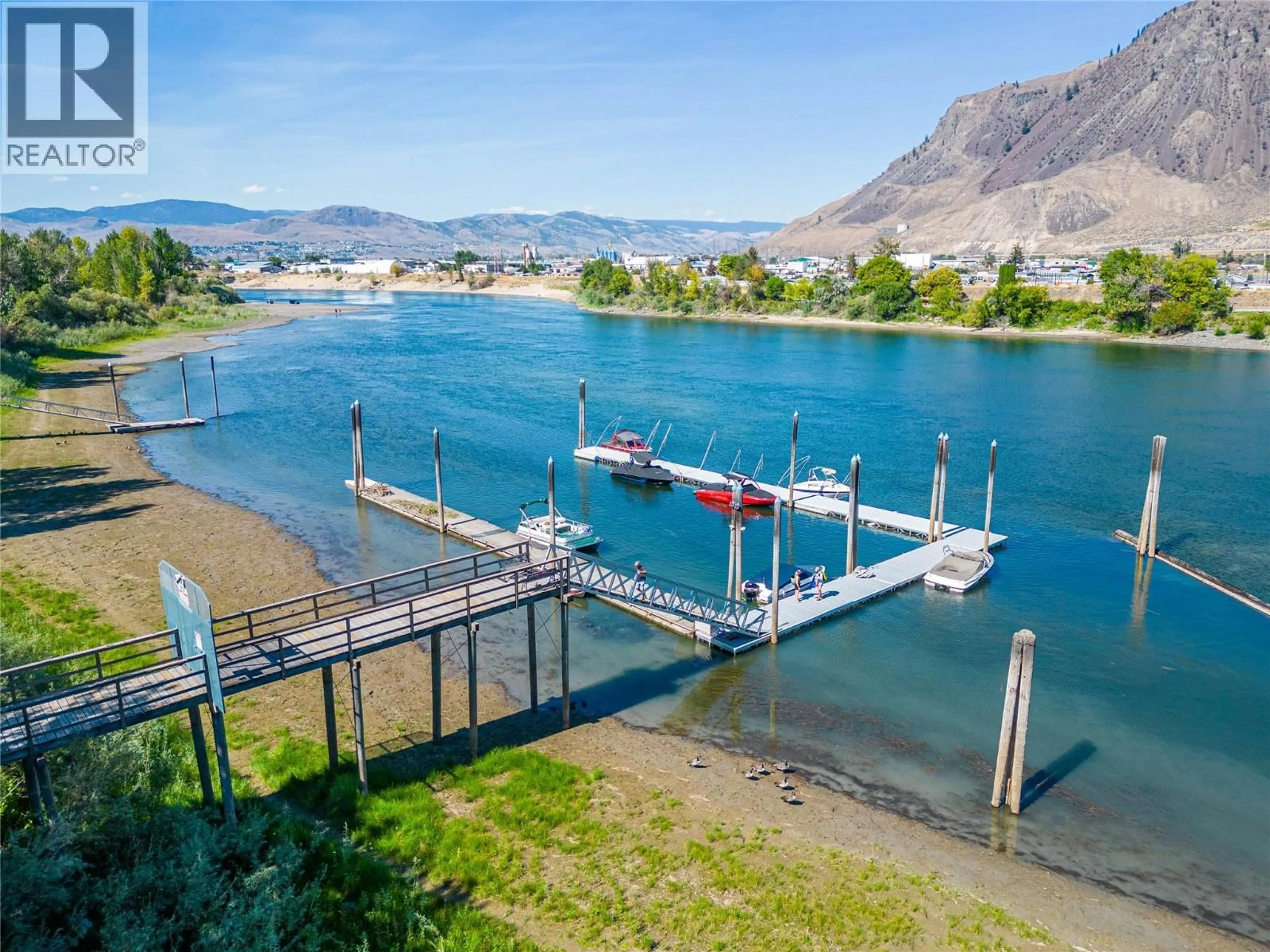 A pic from outside/outdoor area/front of a property/back of a property/a pic from drone, water/lake/river/ocean view for 405 - 970 LORNE STREET, Kamloops British Columbia V2C1W9