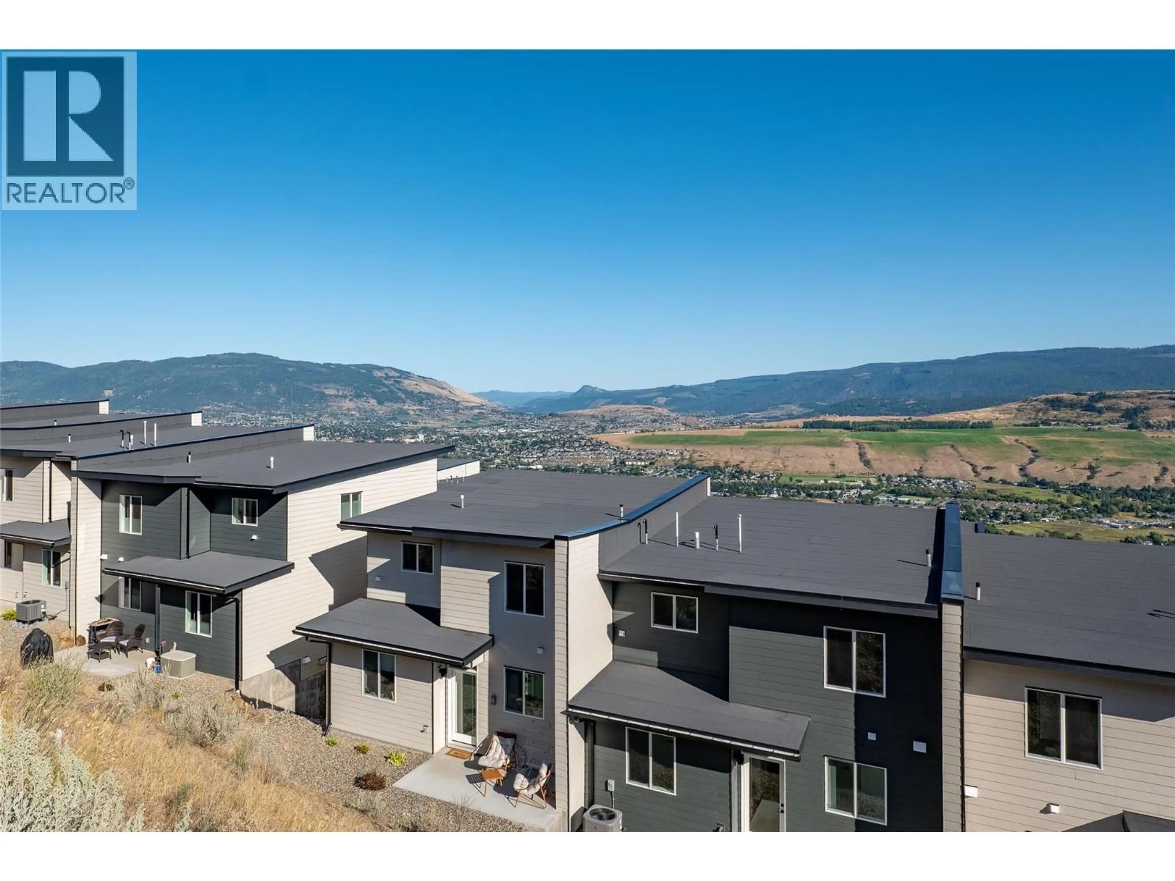 A pic from outside/outdoor area/front of a property/back of a property/a pic from drone, mountain view for 67 - 7735 OKANAGAN HILLS BOULEVARD, Vernon British Columbia V1H0A7