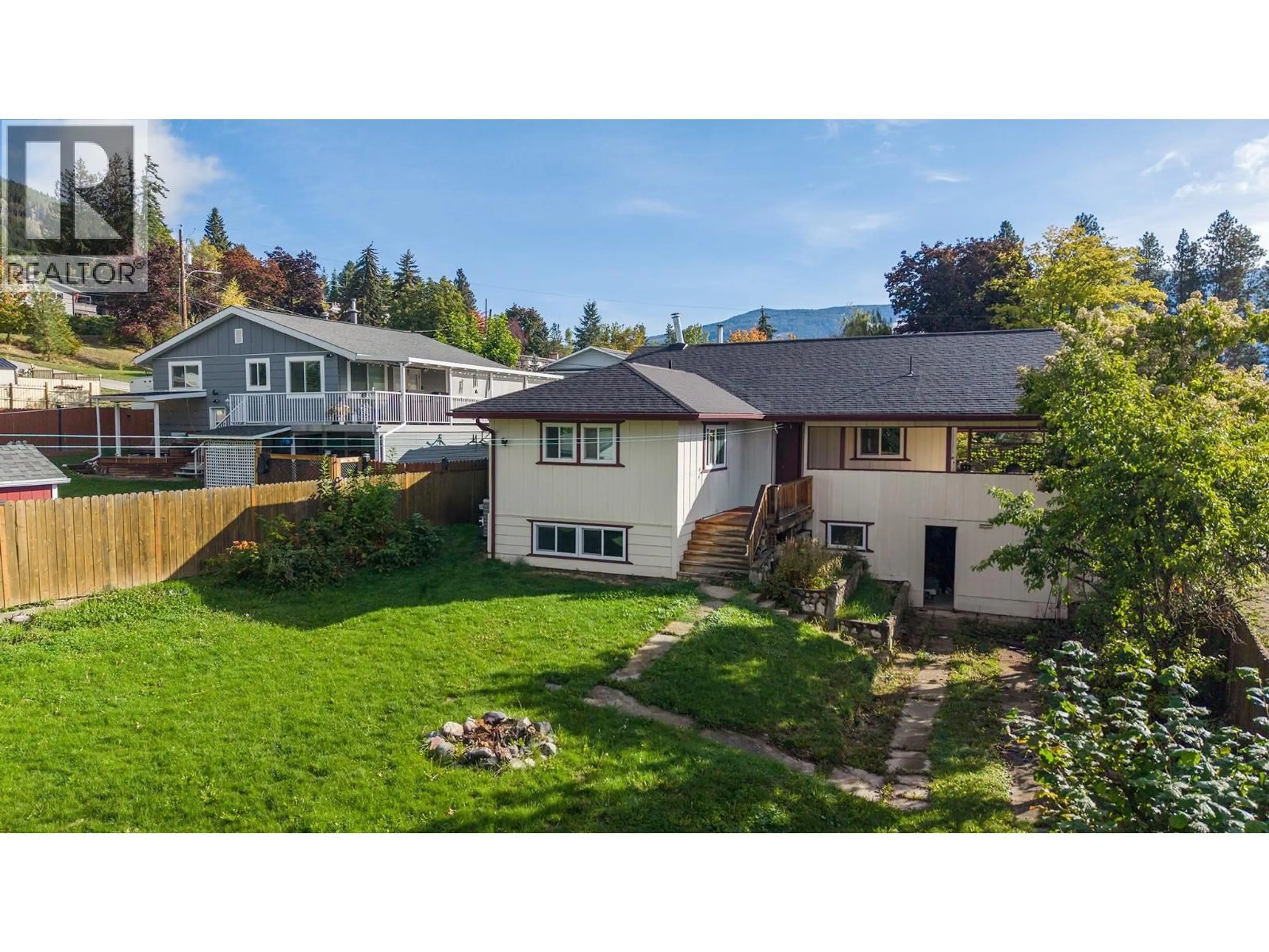 A pic from outside/outdoor area/front of a property/back of a property/a pic from drone, mountain view for 115 24TH AVENUE NORTH, Creston British Columbia V0B1G5