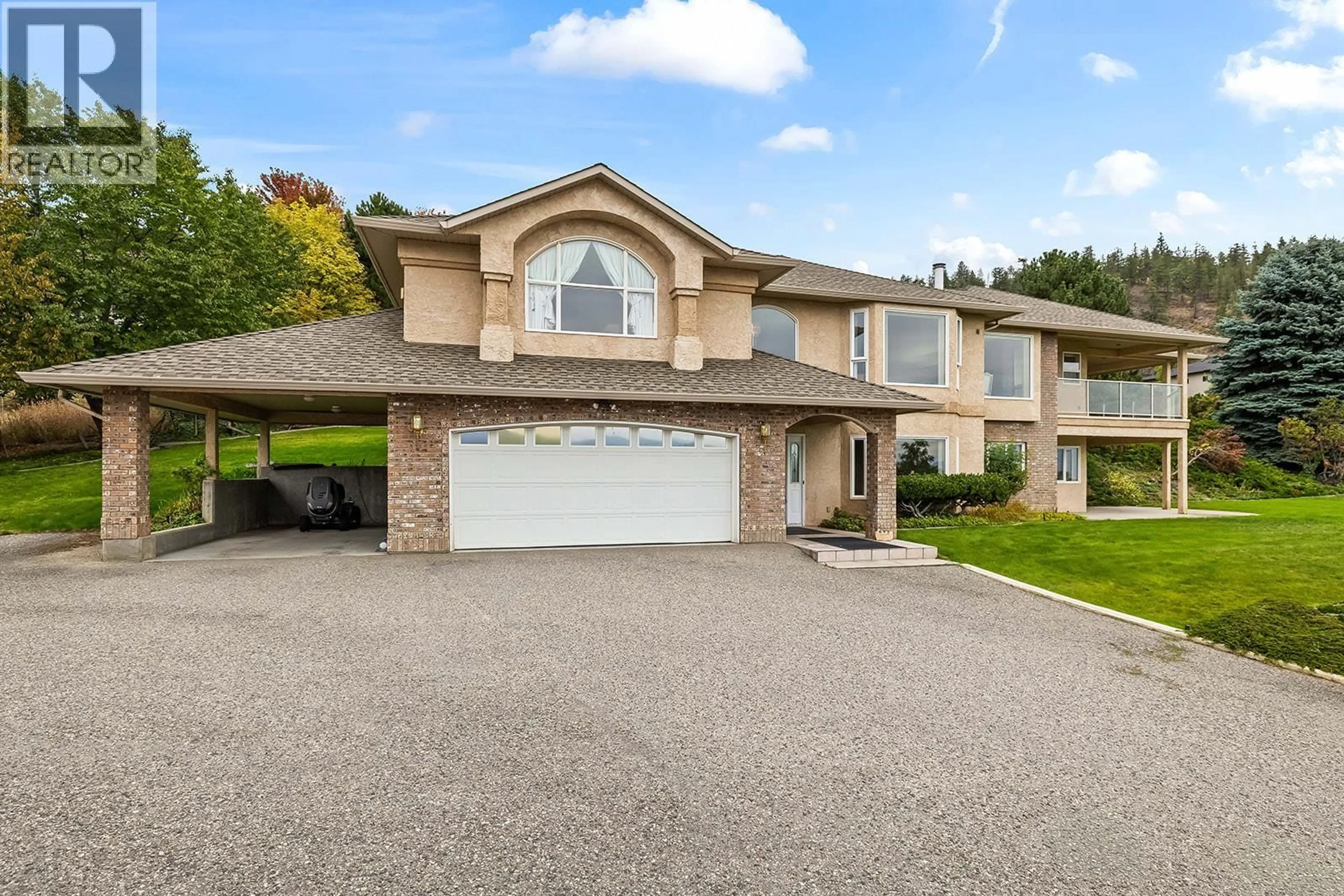 Home with vinyl exterior material, street for 695 VALLEY ROAD, Kelowna British Columbia V1V2E6