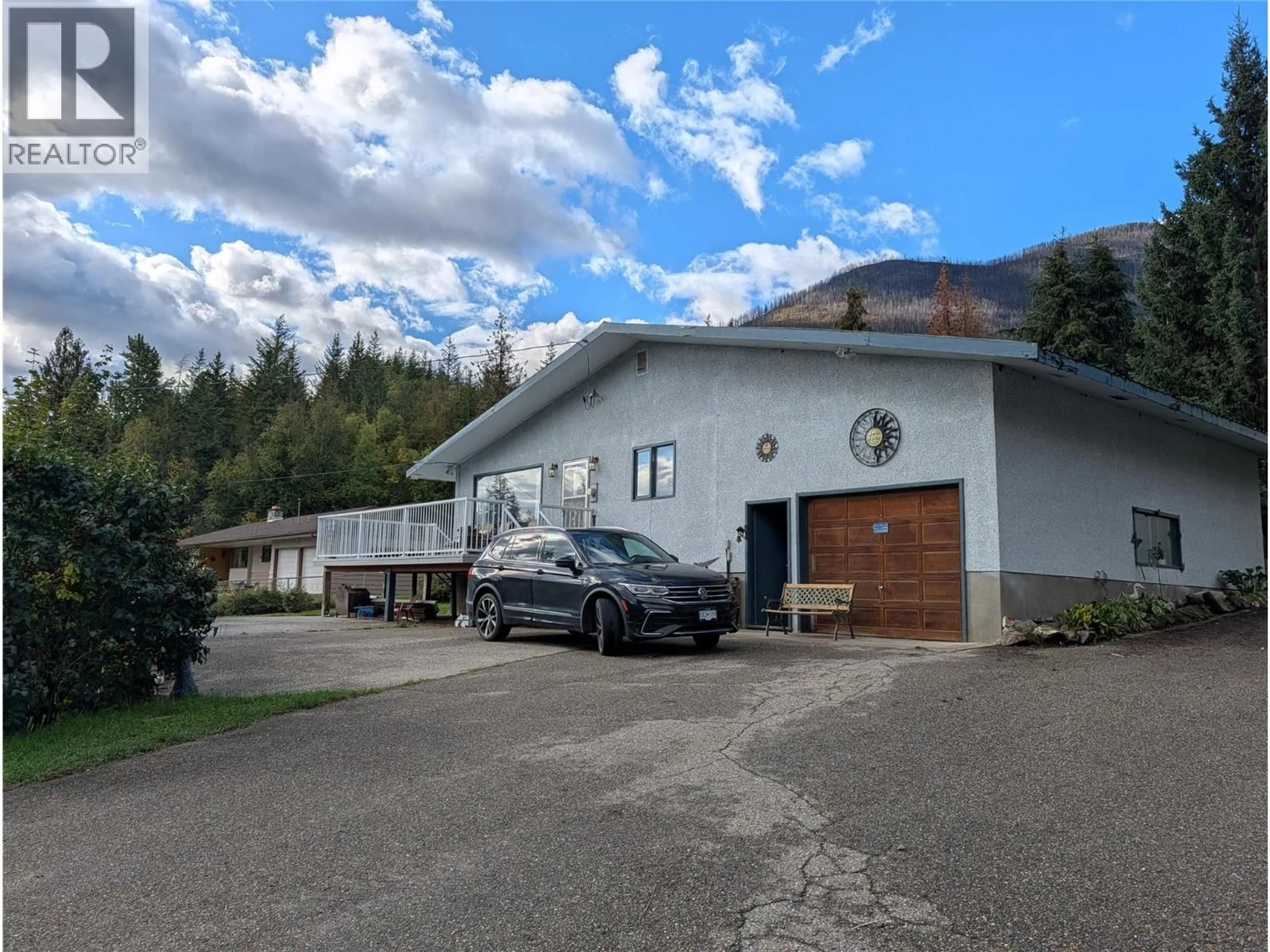 A pic from outside/outdoor area/front of a property/back of a property/a pic from drone, mountain view for 8893 HOLDING ROAD, Adams Lake British Columbia V0E1M2