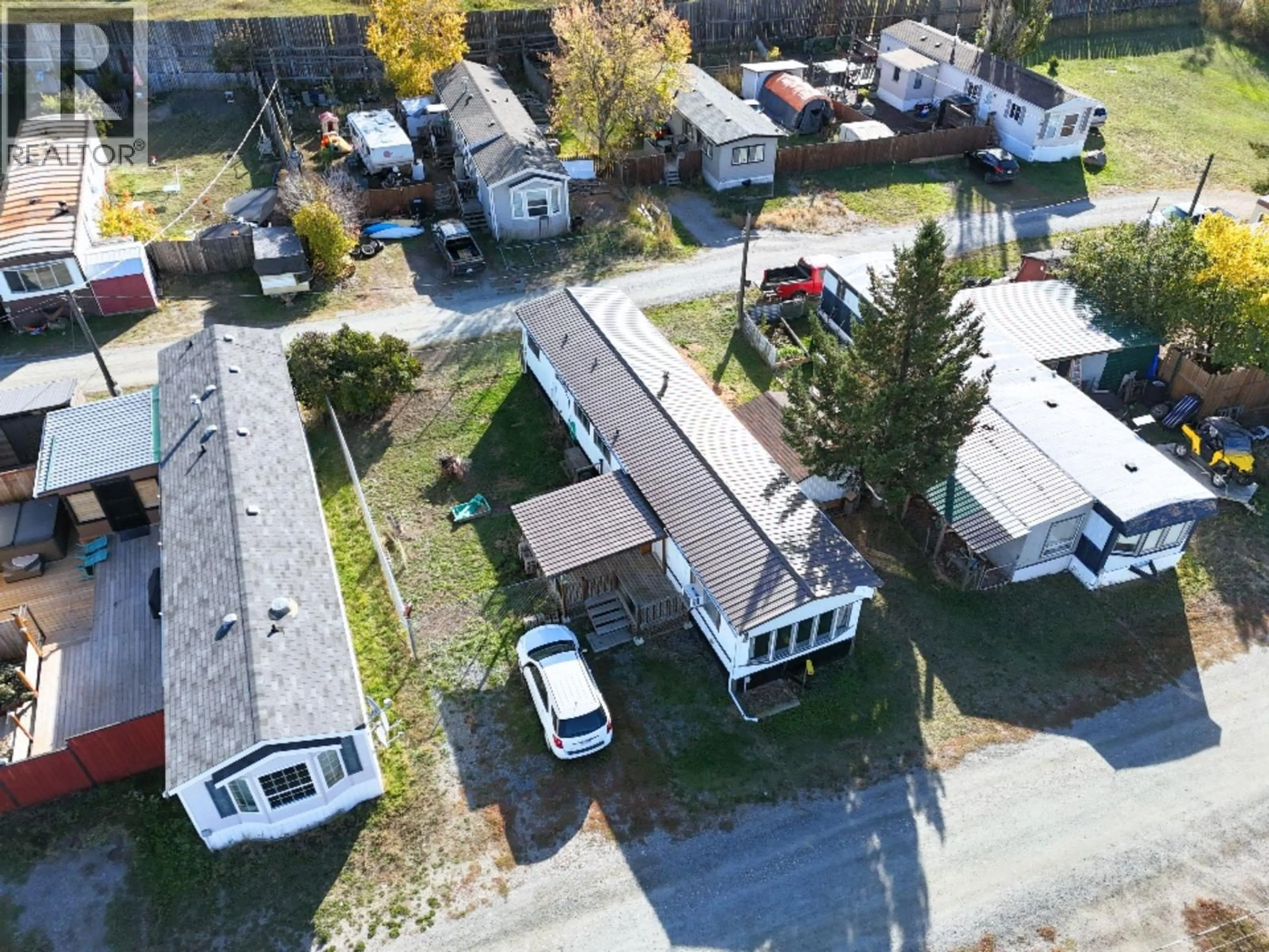 A pic from outside/outdoor area/front of a property/back of a property/a pic from drone, street for 11 - 9762 ERMACORA ROAD, Wycliffe British Columbia V1C7E1