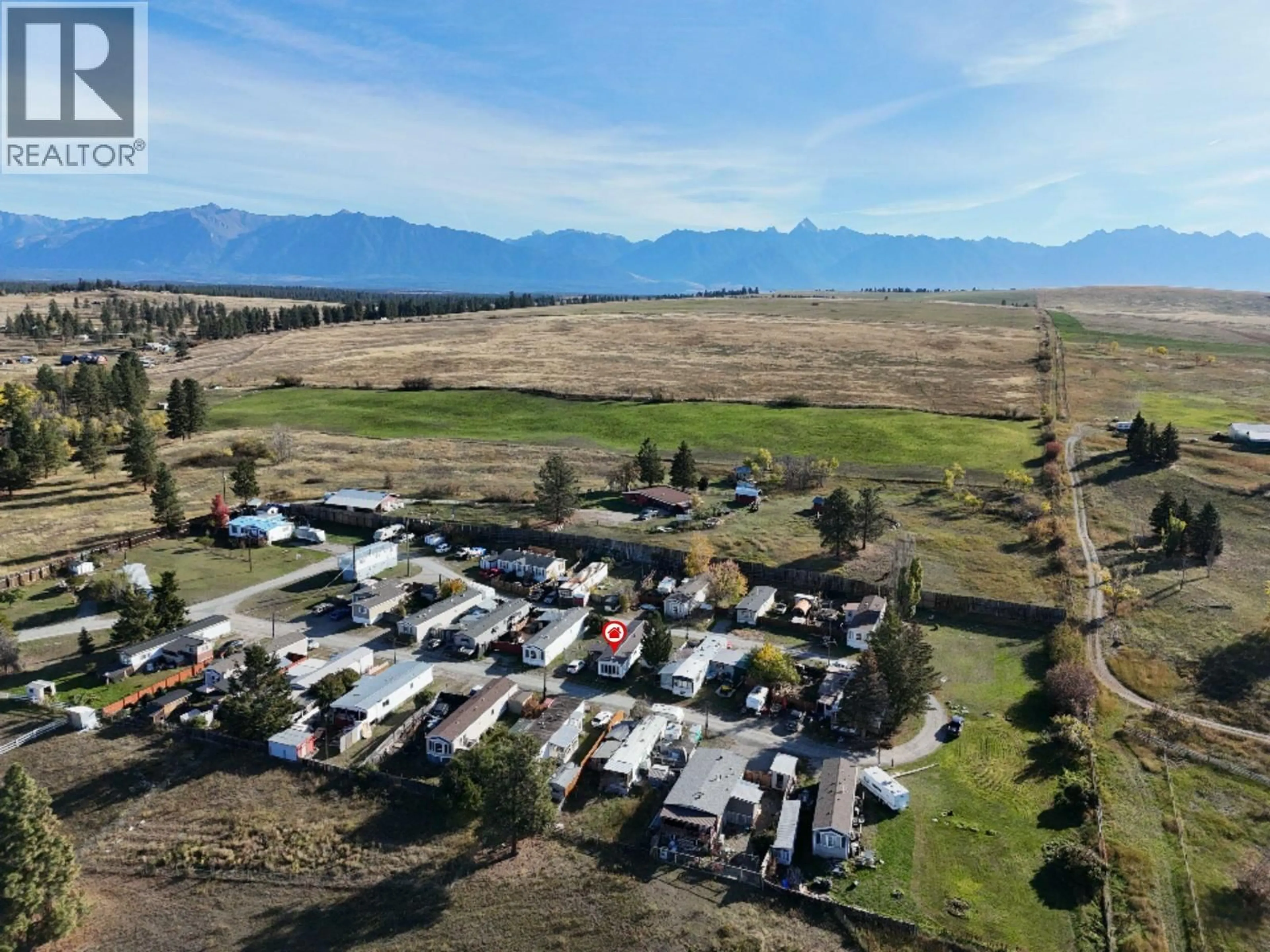 A pic from outside/outdoor area/front of a property/back of a property/a pic from drone, mountain view for 11 - 9762 ERMACORA ROAD, Wycliffe British Columbia V1C7E1