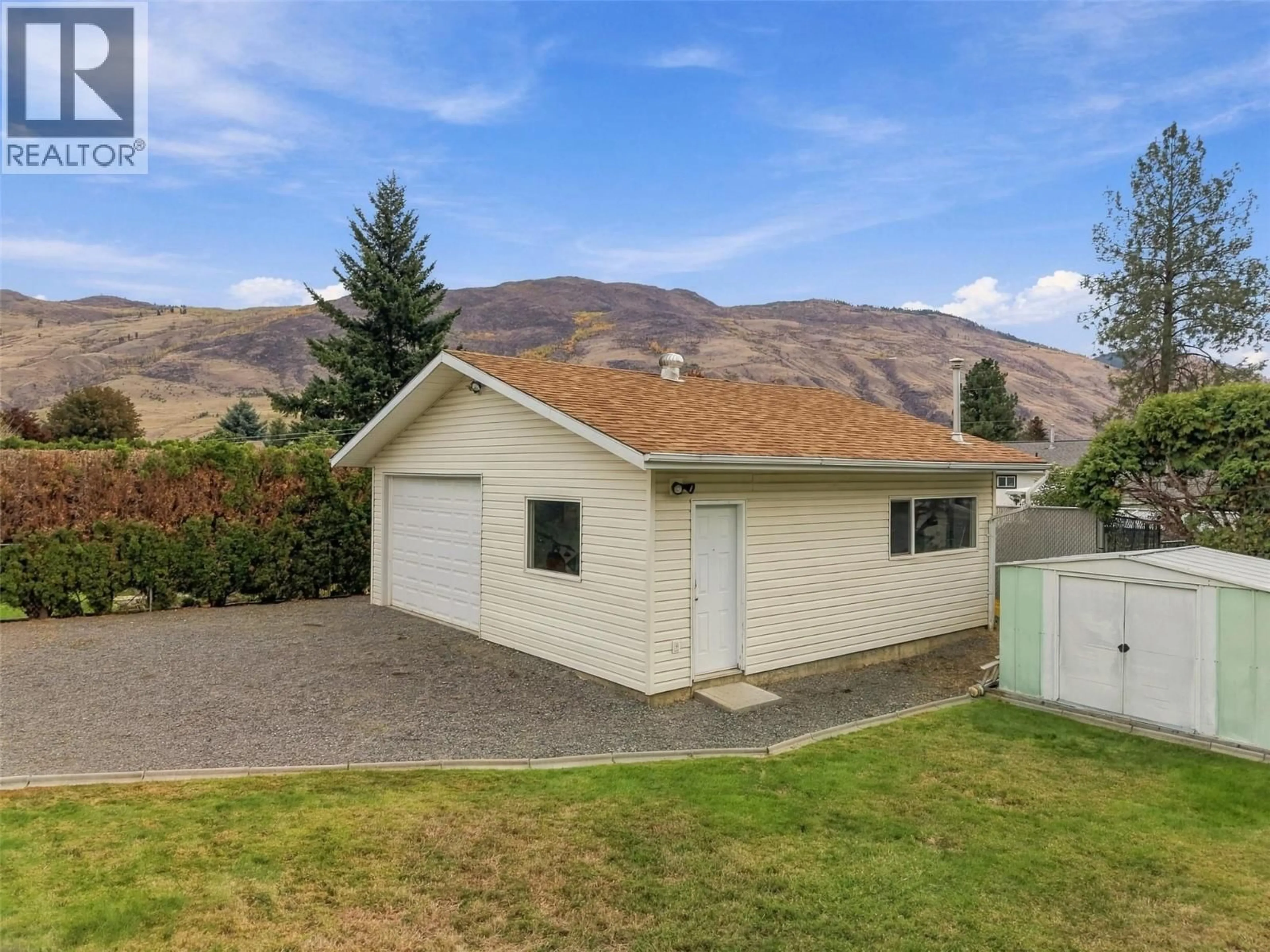A pic from outside/outdoor area/front of a property/back of a property/a pic from drone, mountain view for 851 SUMAC PLACE, Kamloops British Columbia V2B6R4