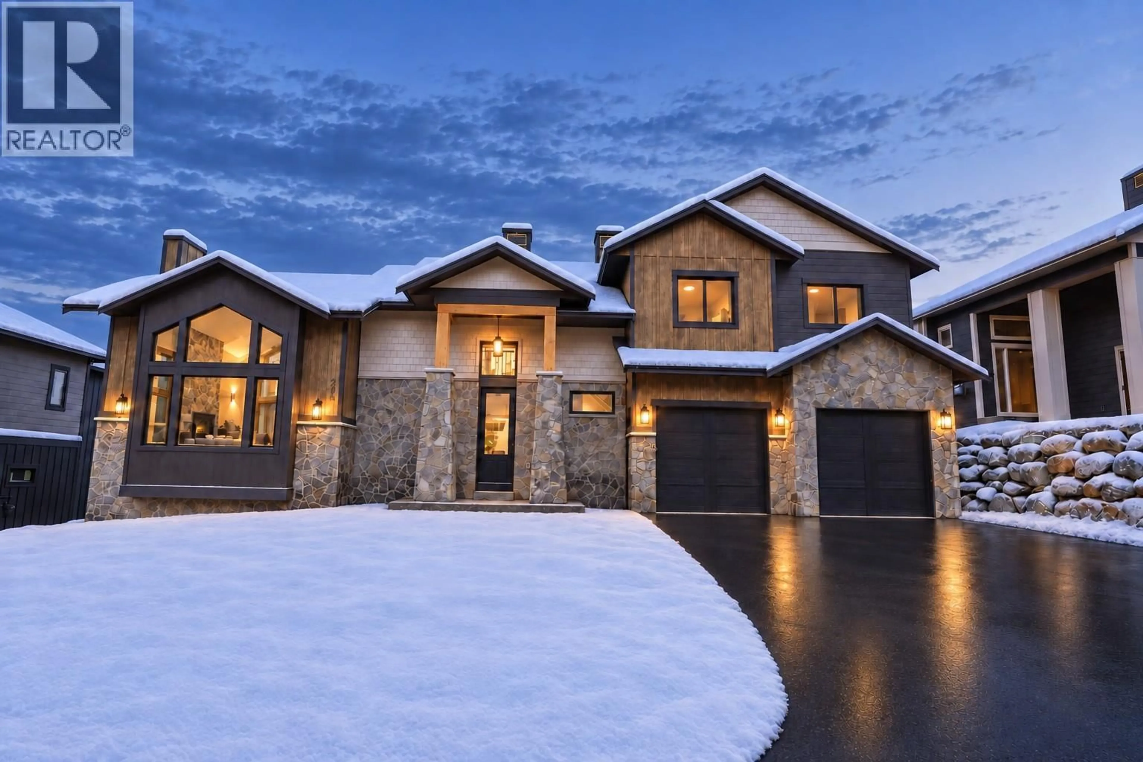 Home with brick exterior material, street for 205 GRIZZLY RIDGE TRAIL, Big White British Columbia V1P1P4