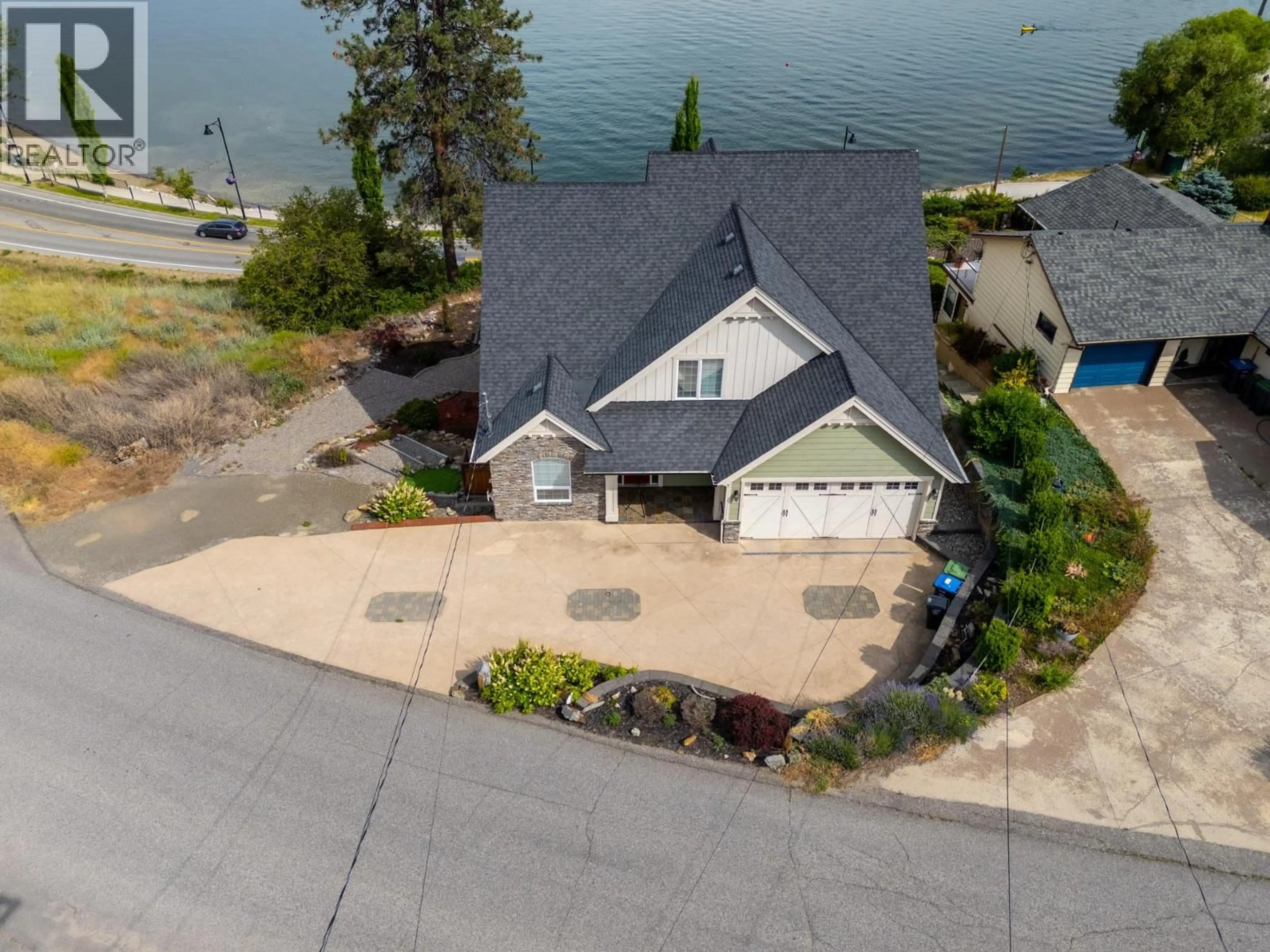A pic from outside/outdoor area/front of a property/back of a property/a pic from drone, water/lake/river/ocean view for 3869 ANGUS DRIVE, West Kelowna British Columbia V4T2J8