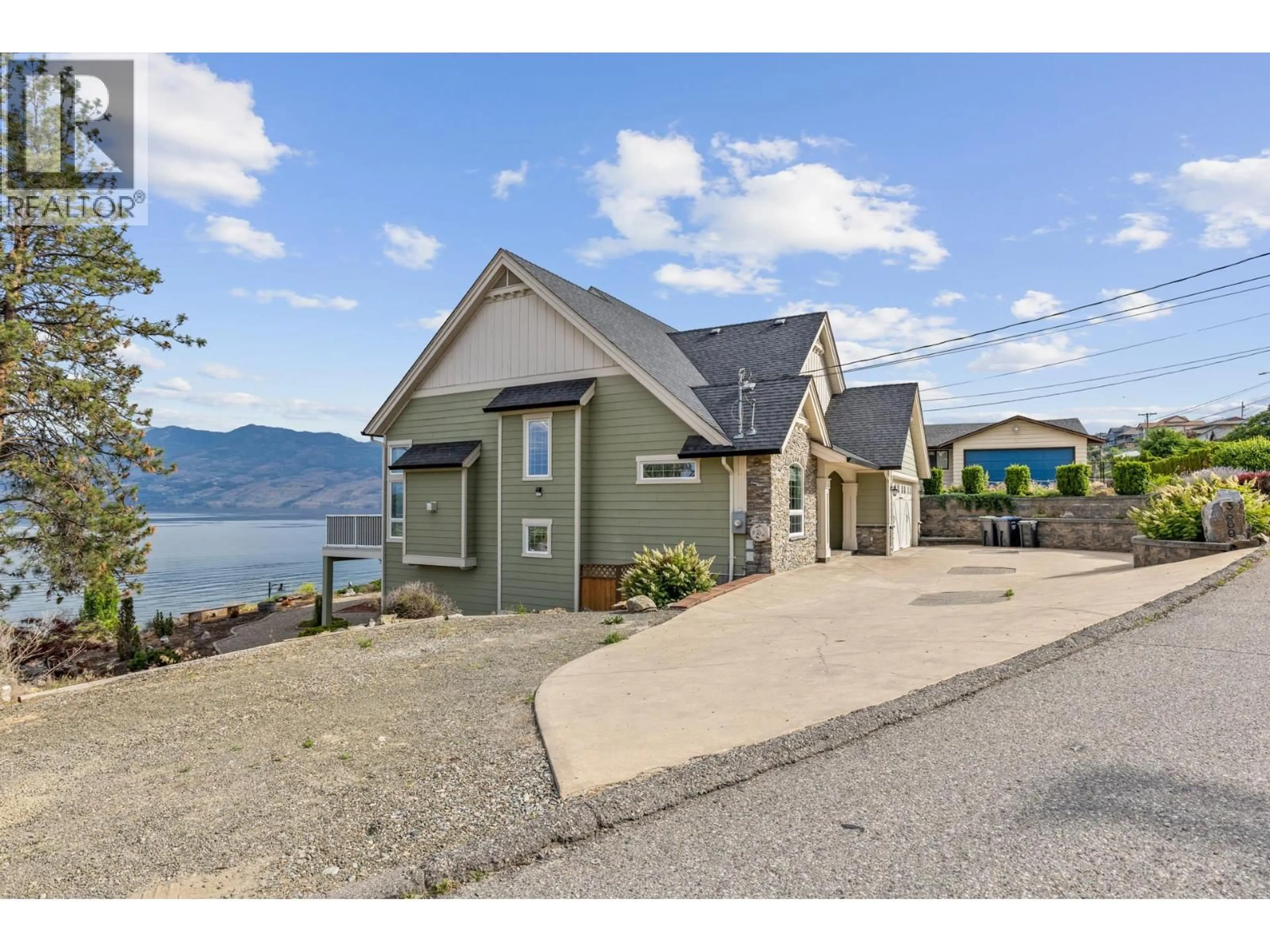 A pic from outside/outdoor area/front of a property/back of a property/a pic from drone, water/lake/river/ocean view for 3869 ANGUS DRIVE, West Kelowna British Columbia V4T2J8