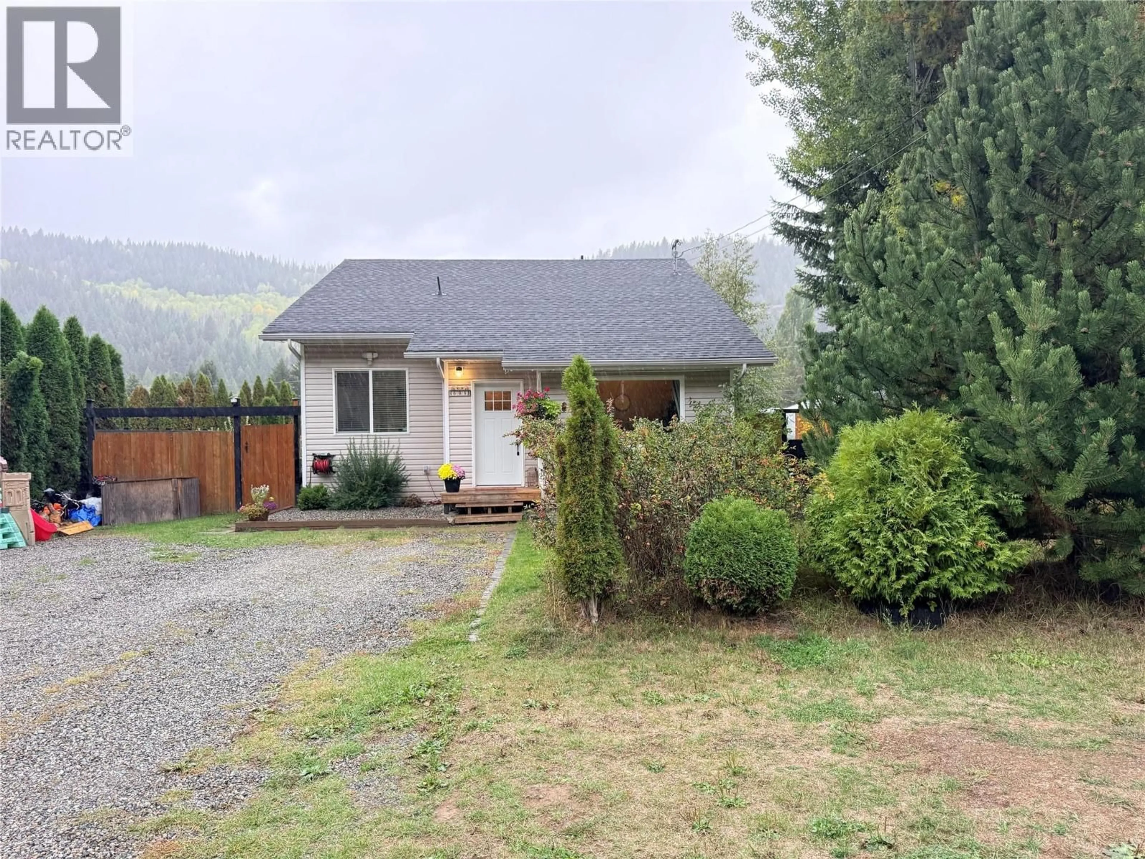 A pic from outside/outdoor area/front of a property/back of a property/a pic from drone, mountain view for 699 STRATHMORE AVENUE, Greenwood British Columbia V0H1J0