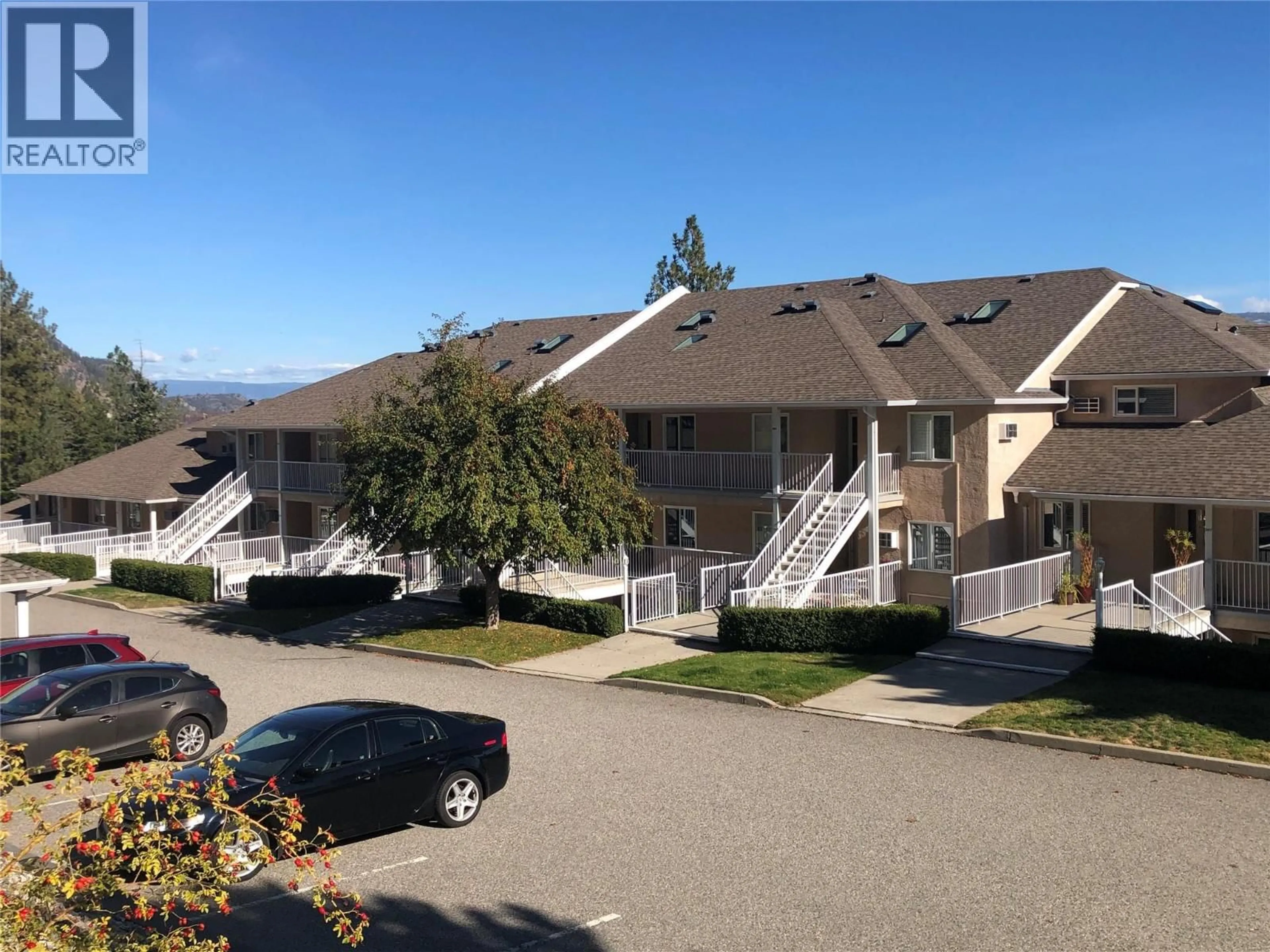 A pic from outside/outdoor area/front of a property/back of a property/a pic from drone, mountain view for 106 - 4630A PONDEROSA DRIVE, Peachland British Columbia V0H1X5