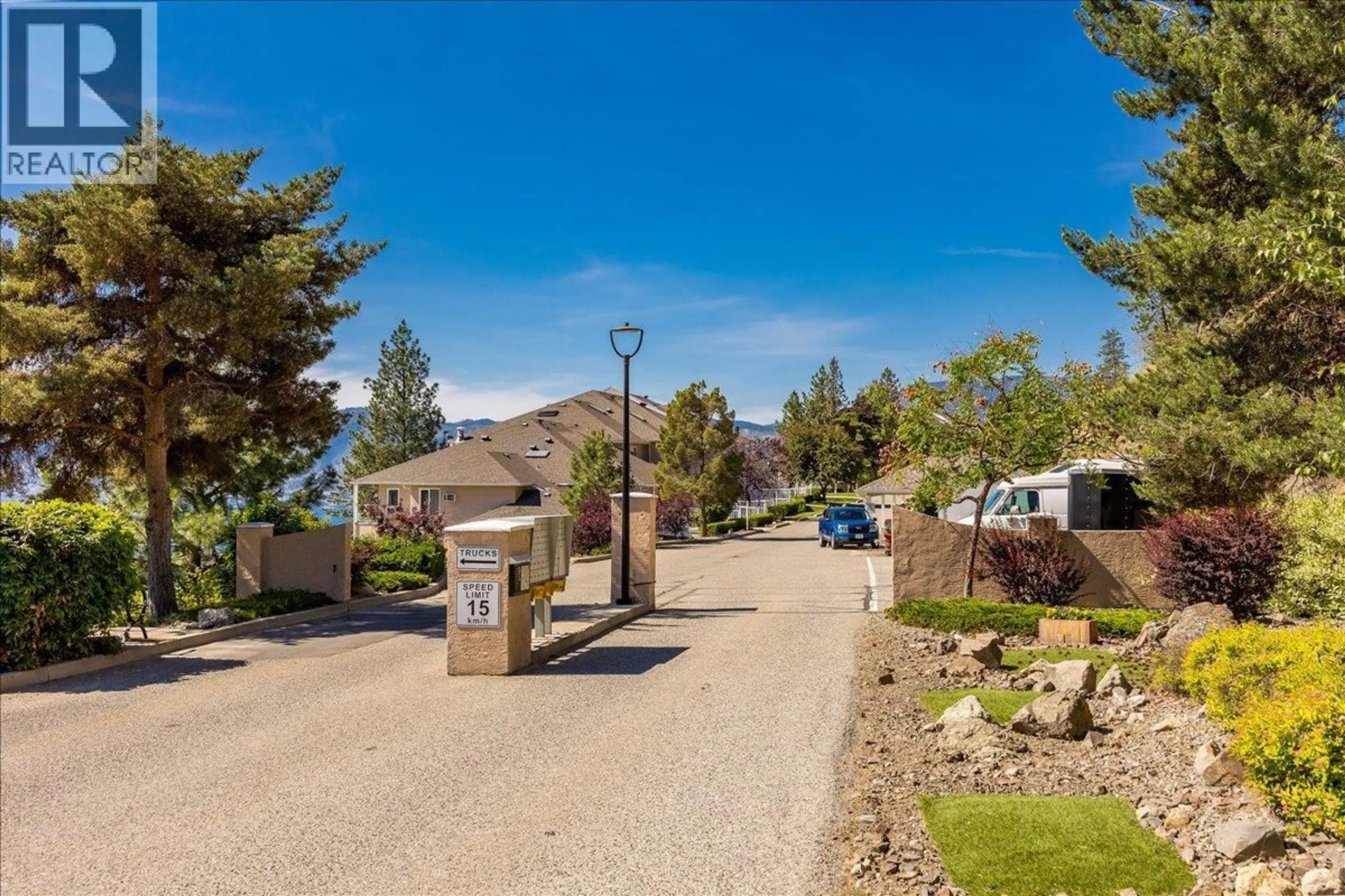 A pic from outside/outdoor area/front of a property/back of a property/a pic from drone, mountain view for 106 - 4630A PONDEROSA DRIVE, Peachland British Columbia V0H1X5