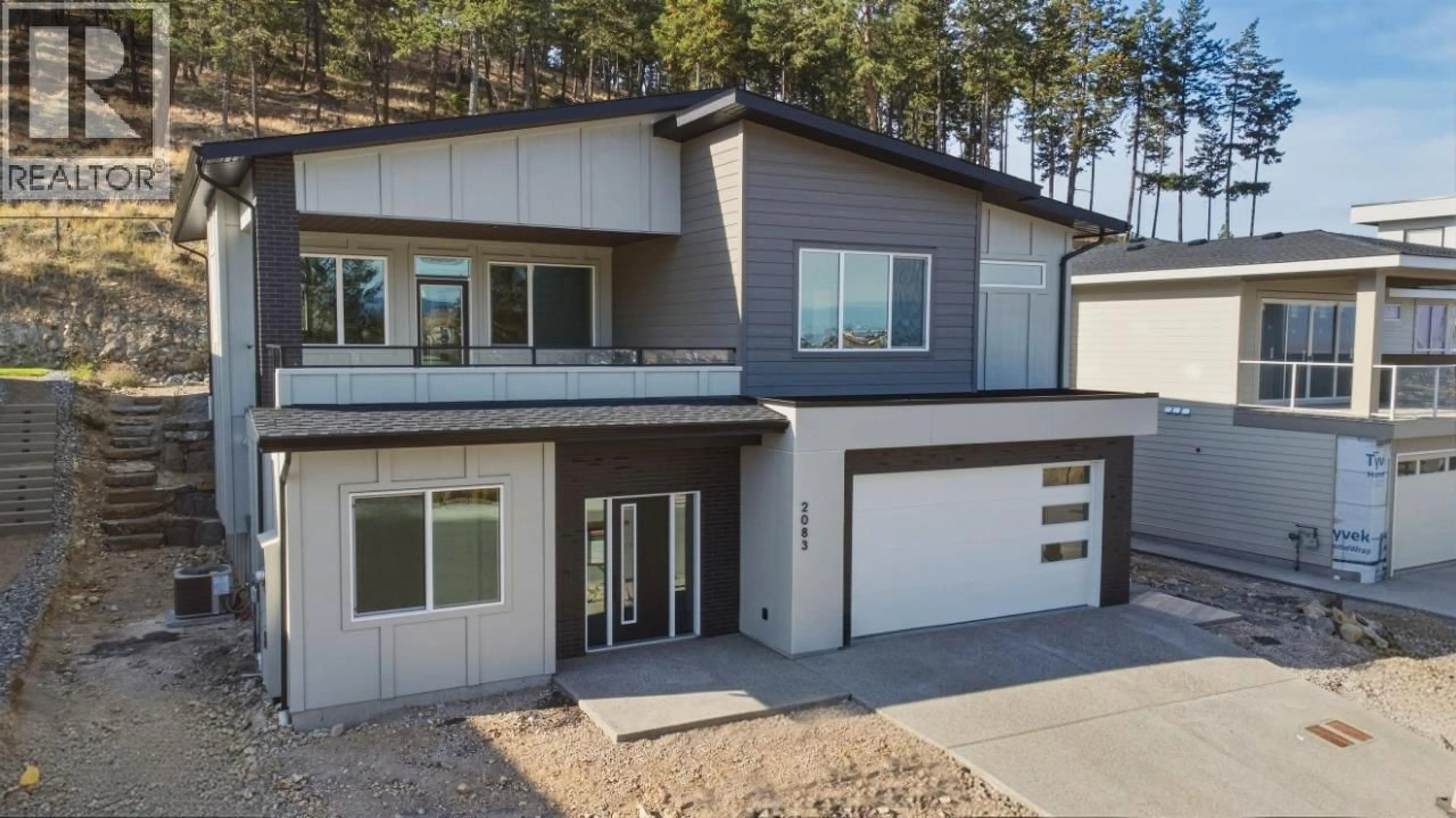 Home with vinyl exterior material, unknown for 2083 CORTINA DRIVE, Kelowna British Columbia V1P1V1