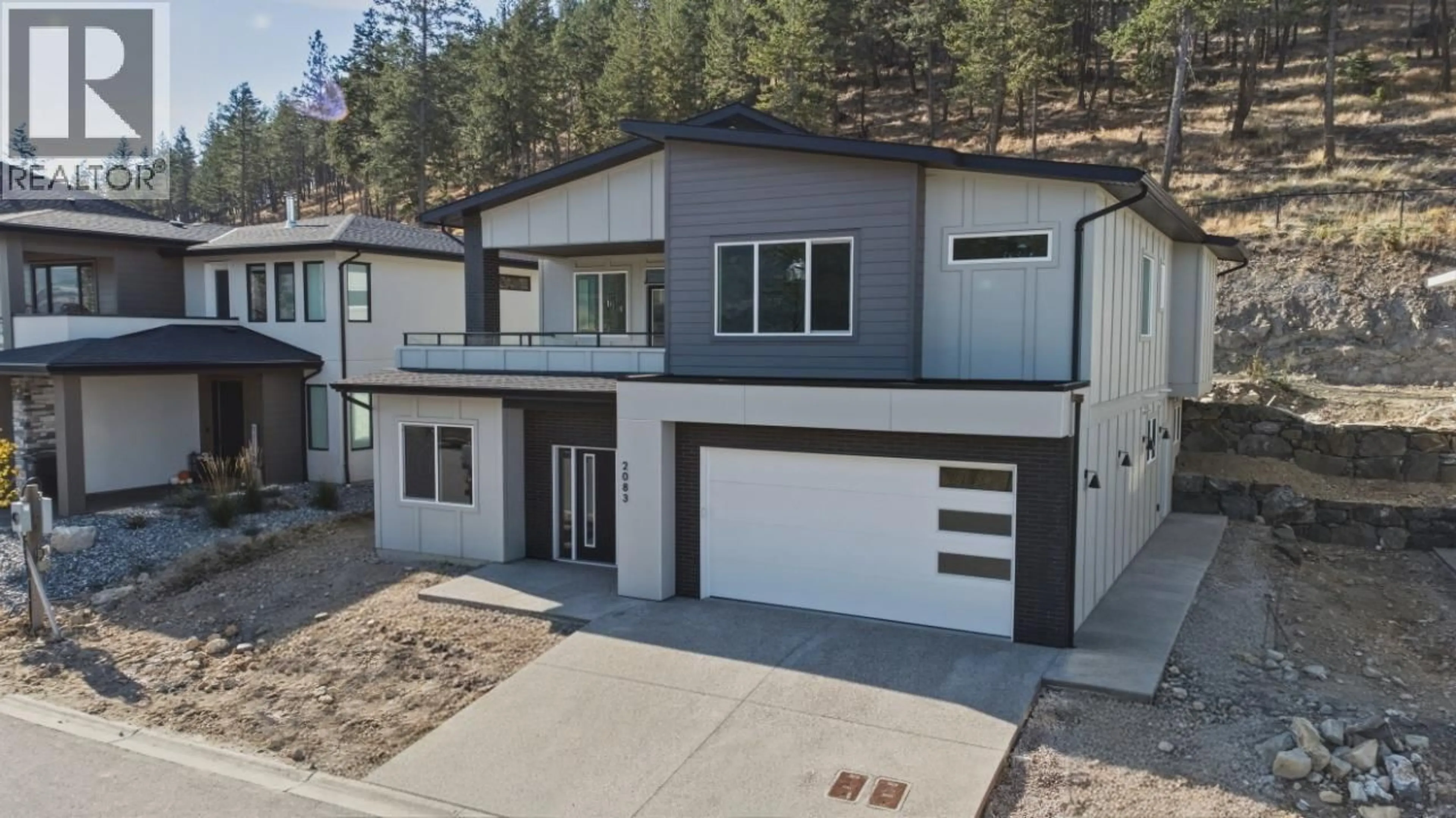 A pic from outside/outdoor area/front of a property/back of a property/a pic from drone, street for 2083 CORTINA DRIVE, Kelowna British Columbia V1P1V1
