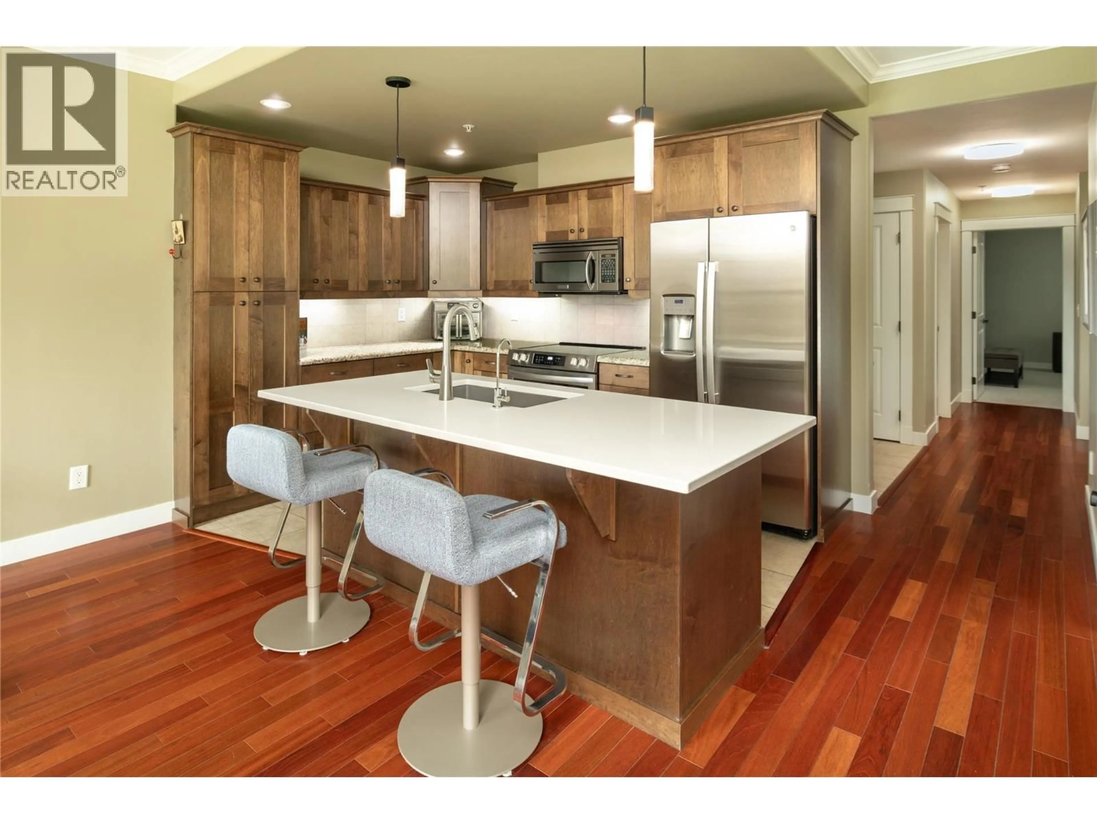 Contemporary kitchen, wood/laminate floor for 207 - 2470 TUSCANY DRIVE, West Kelowna British Columbia V4T3G8