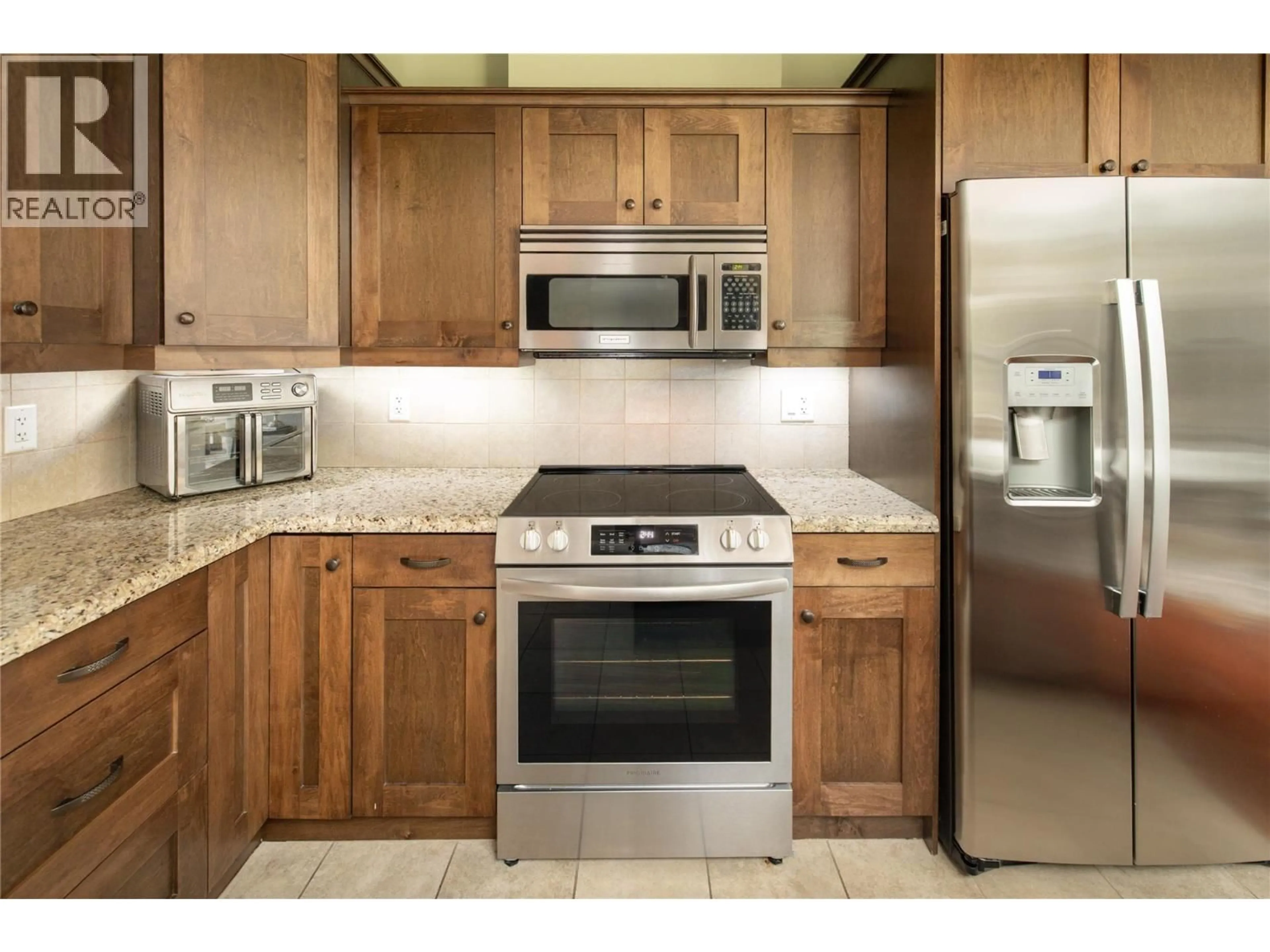 Standard kitchen, ceramic/tile floor for 207 - 2470 TUSCANY DRIVE, West Kelowna British Columbia V4T3G8