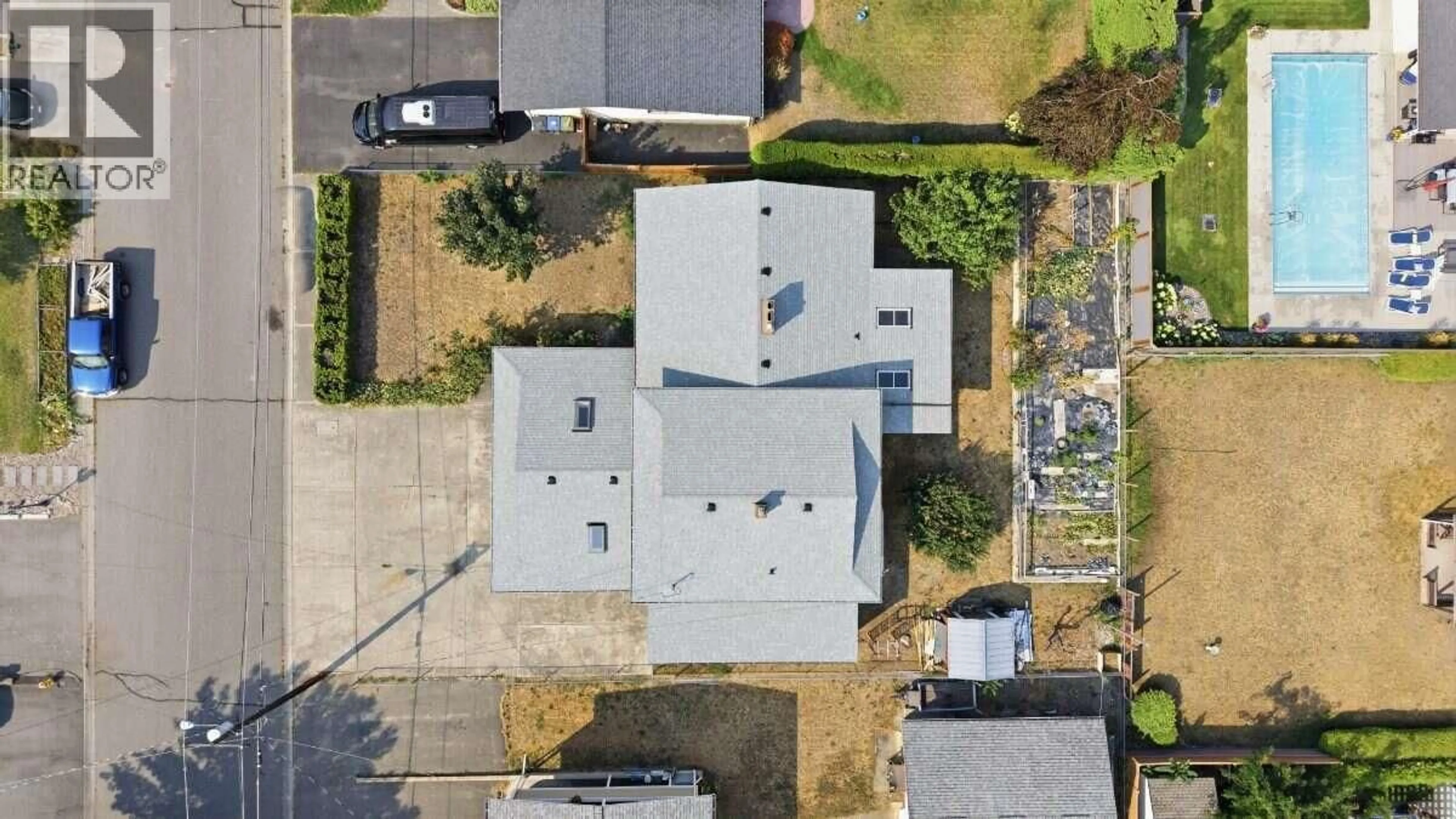 A pic from outside/outdoor area/front of a property/back of a property/a pic from drone, street for 2555 GRENFELL ROAD, Kelowna British Columbia V1Y3C9