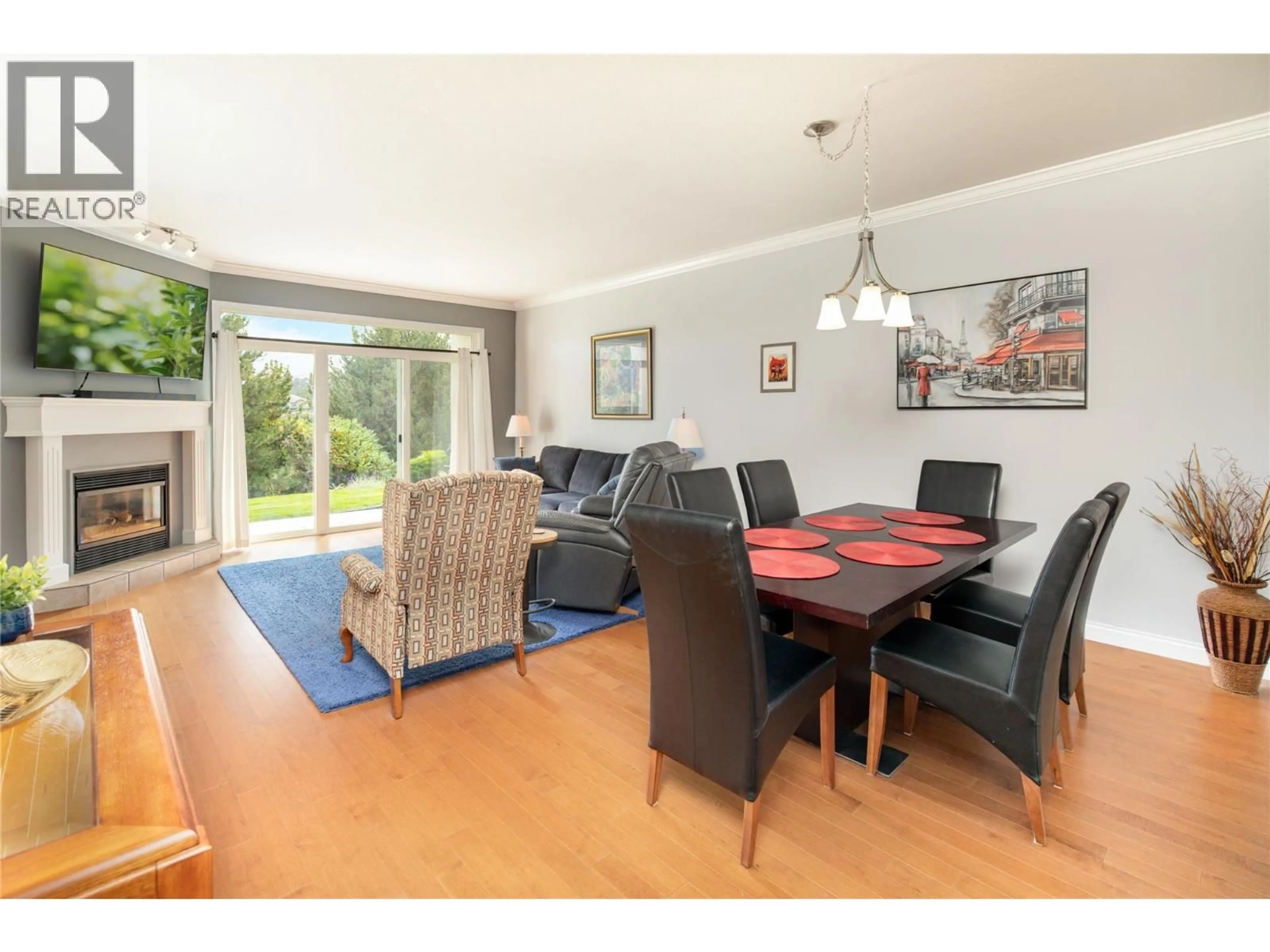 Dining room, wood/laminate floor for 104 - 2377 SHANNON WOODS DRIVE, West Kelowna British Columbia V4T2L8