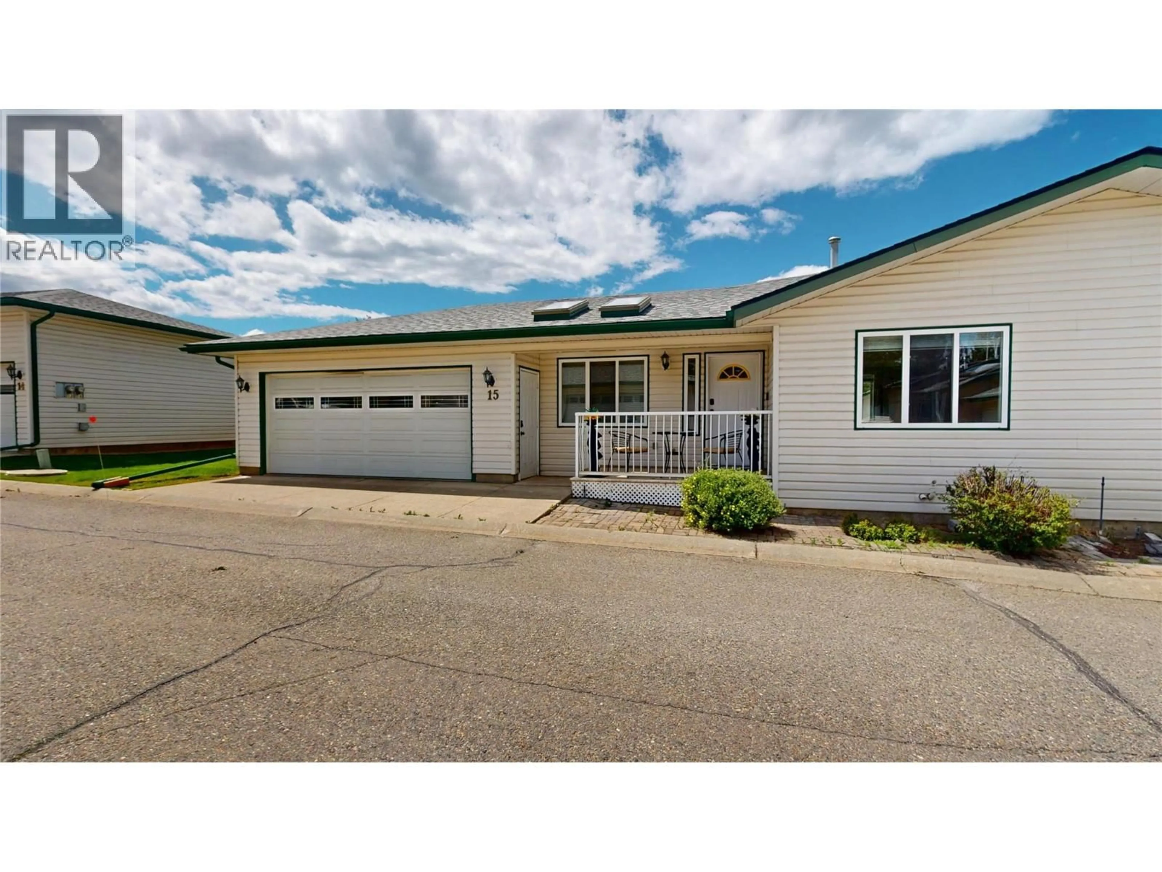 Home with vinyl exterior material, street for 15 - 2375 1ST STREET SOUTH, Cranbrook British Columbia V1C6J7