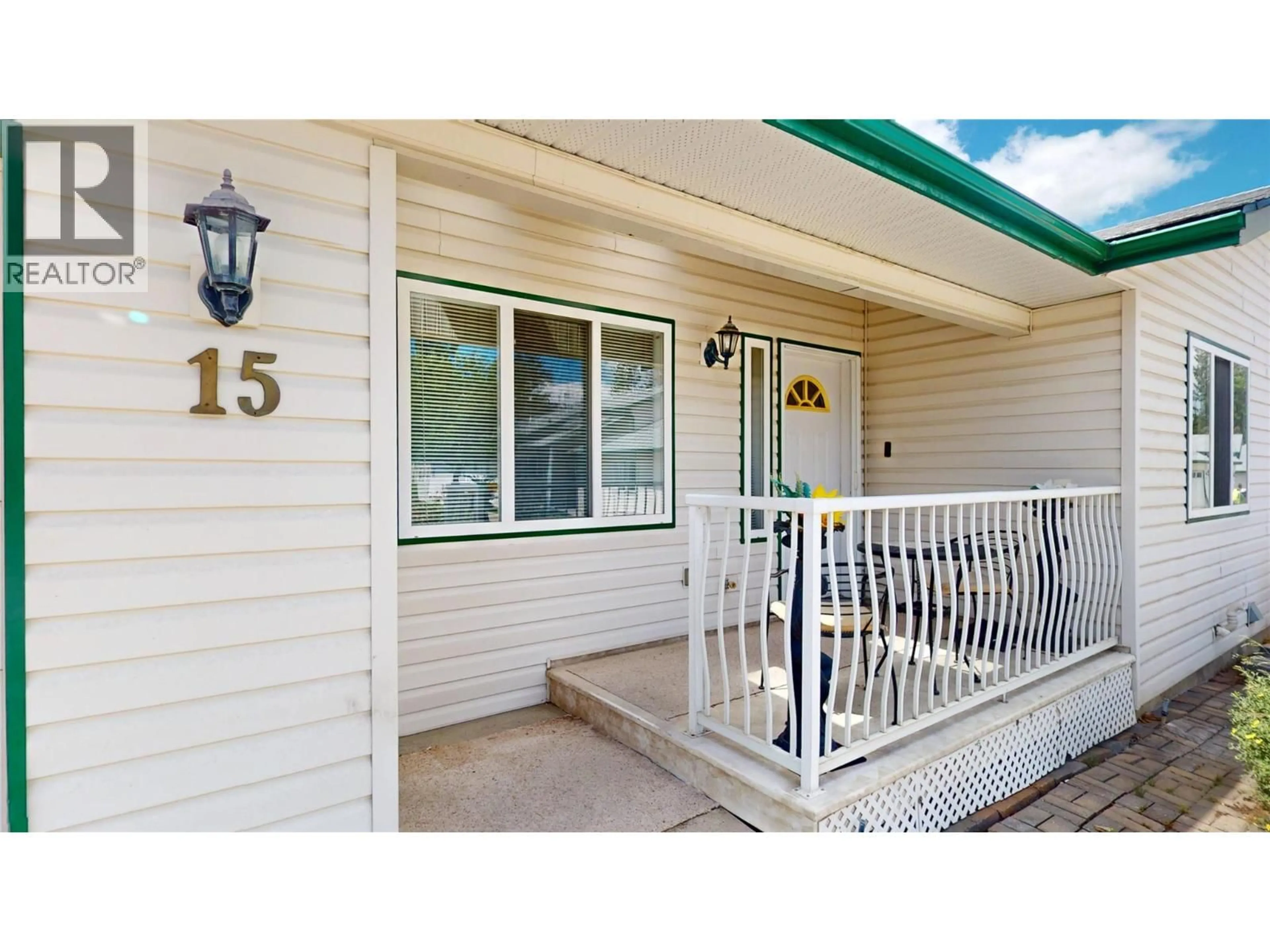 Home with vinyl exterior material, street for 15 - 2375 1ST STREET SOUTH, Cranbrook British Columbia V1C6J7