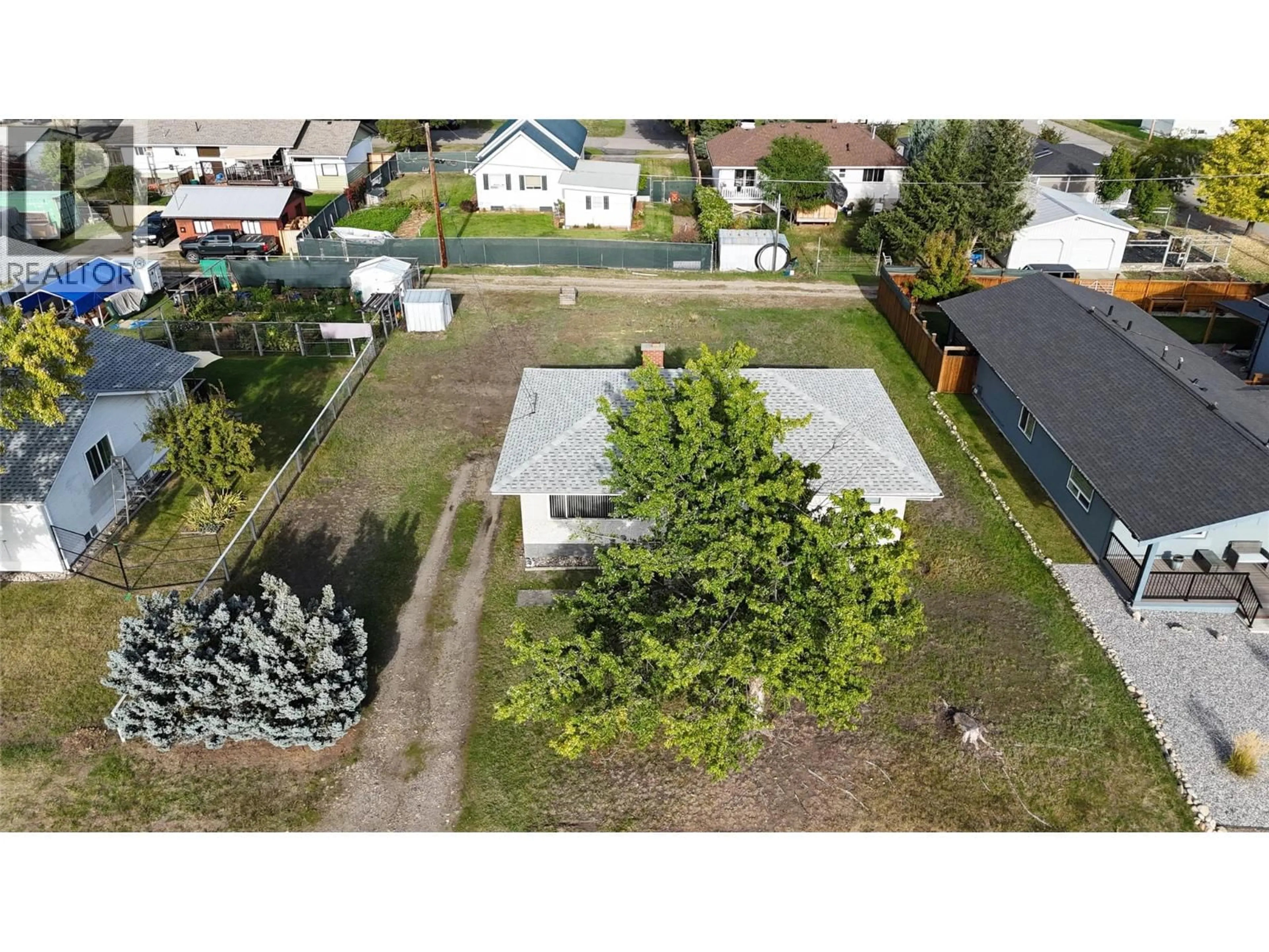 A pic from outside/outdoor area/front of a property/back of a property/a pic from drone, street for 7066 19TH STREET, Grand Forks British Columbia V0H1H2