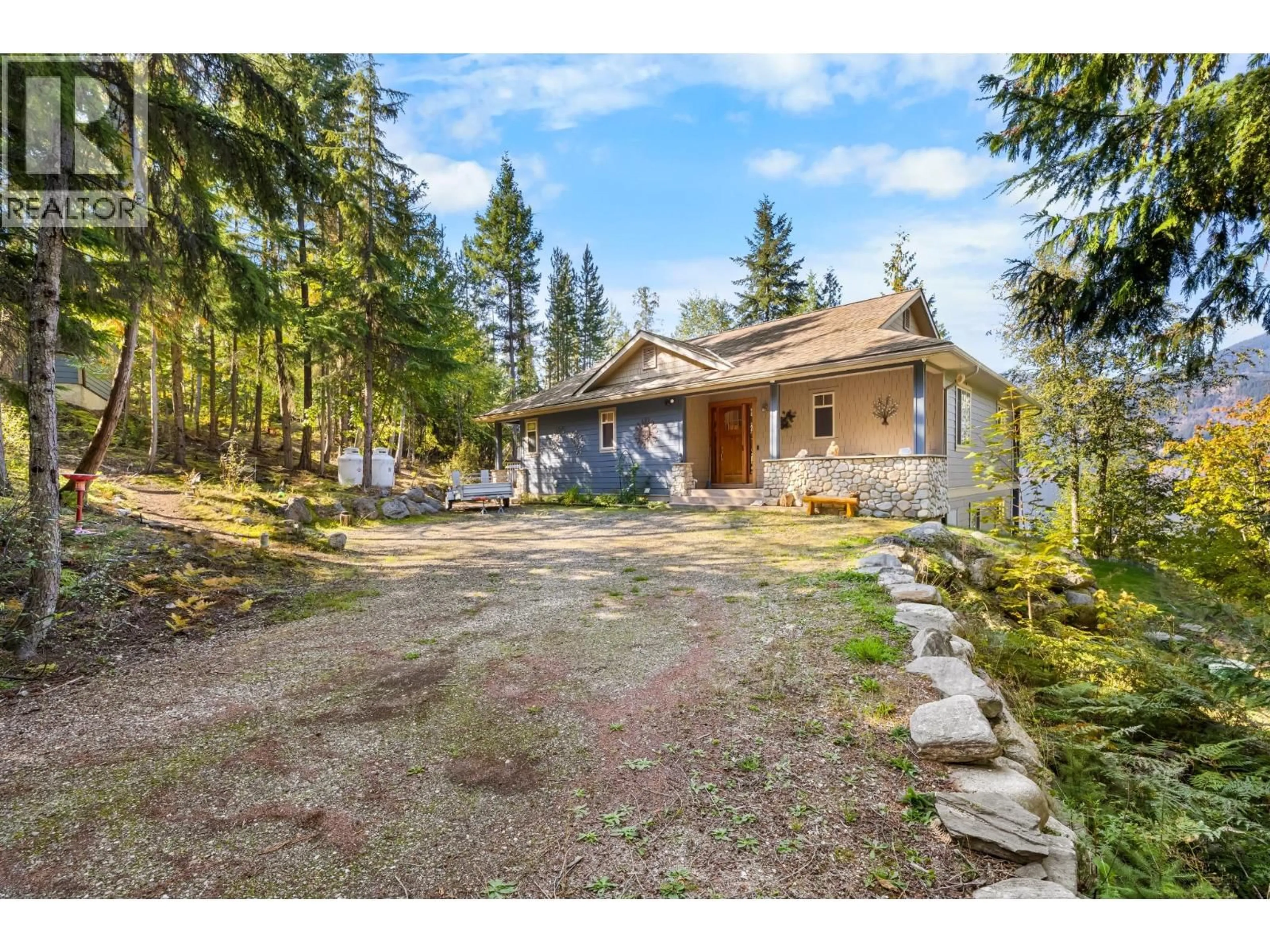 A pic from outside/outdoor area/front of a property/back of a property/a pic from drone, forest/trees view for 487 WALKERS LANDING ROAD, Riondel British Columbia V0B2B0