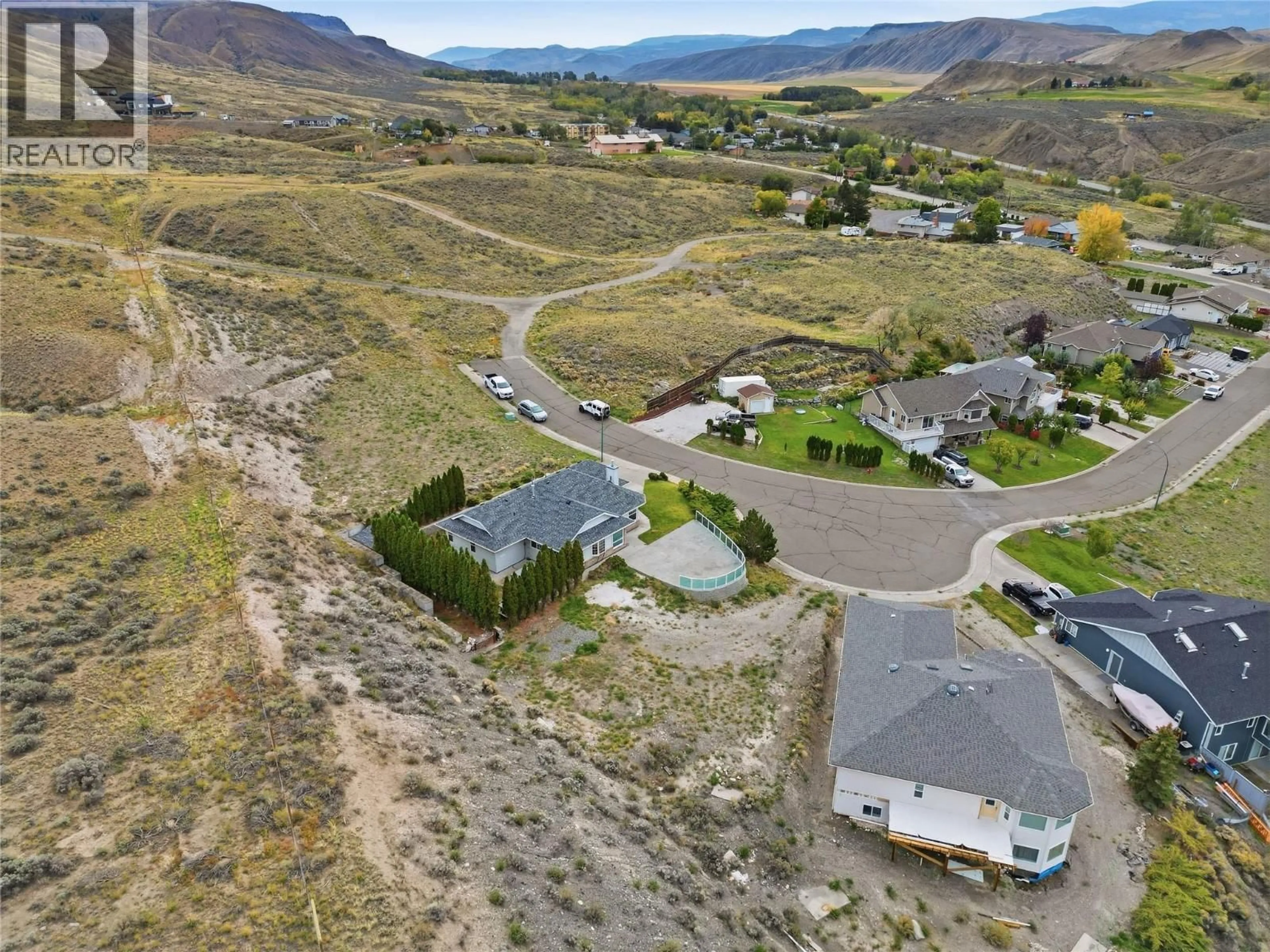 A pic from outside/outdoor area/front of a property/back of a property/a pic from drone, mountain view for 1398/1400 SEMLIN DRIVE, Cache Creek British Columbia V0K1H0