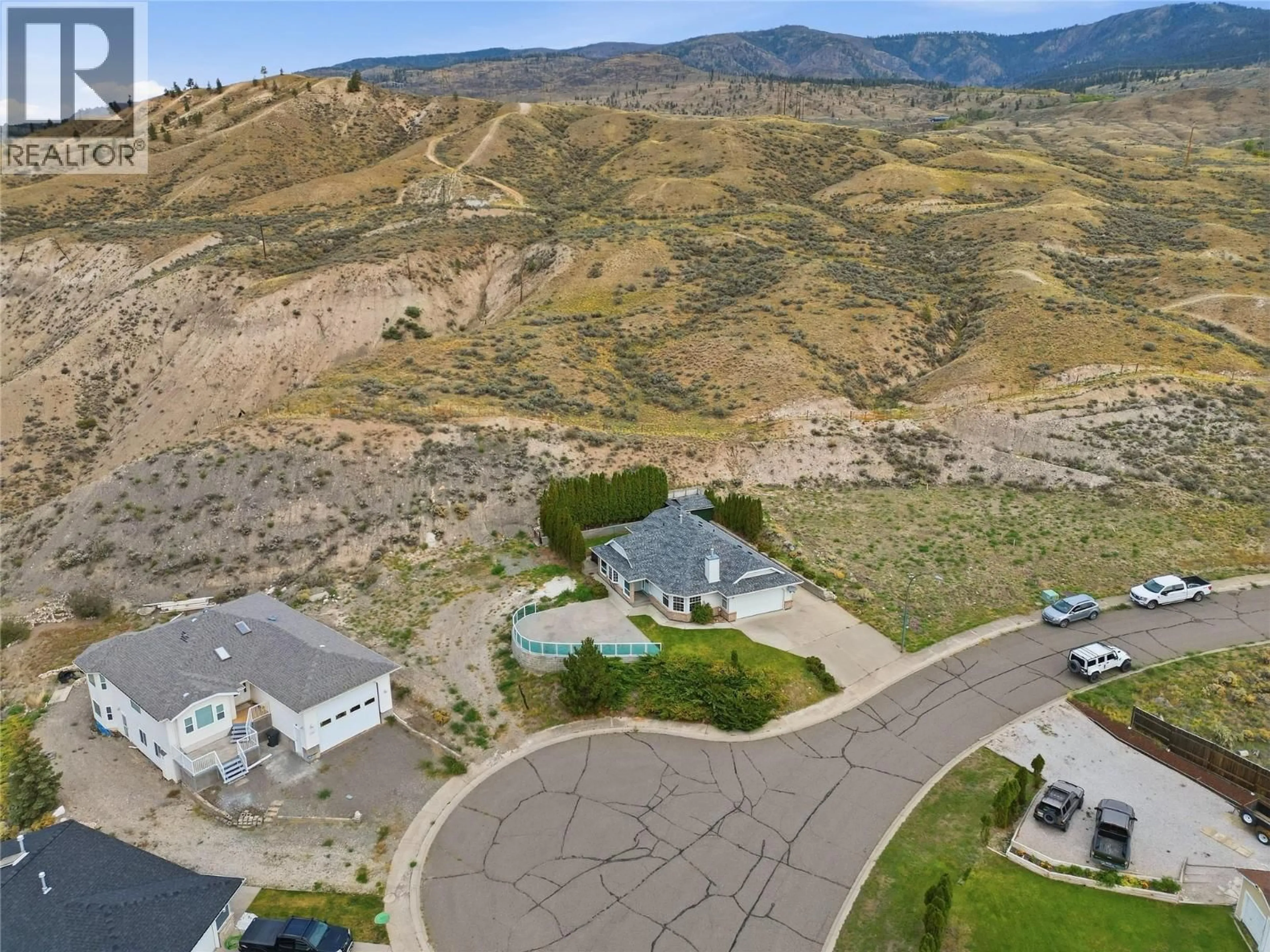 A pic from outside/outdoor area/front of a property/back of a property/a pic from drone, mountain view for 1398/1400 SEMLIN DRIVE, Cache Creek British Columbia V0K1H0