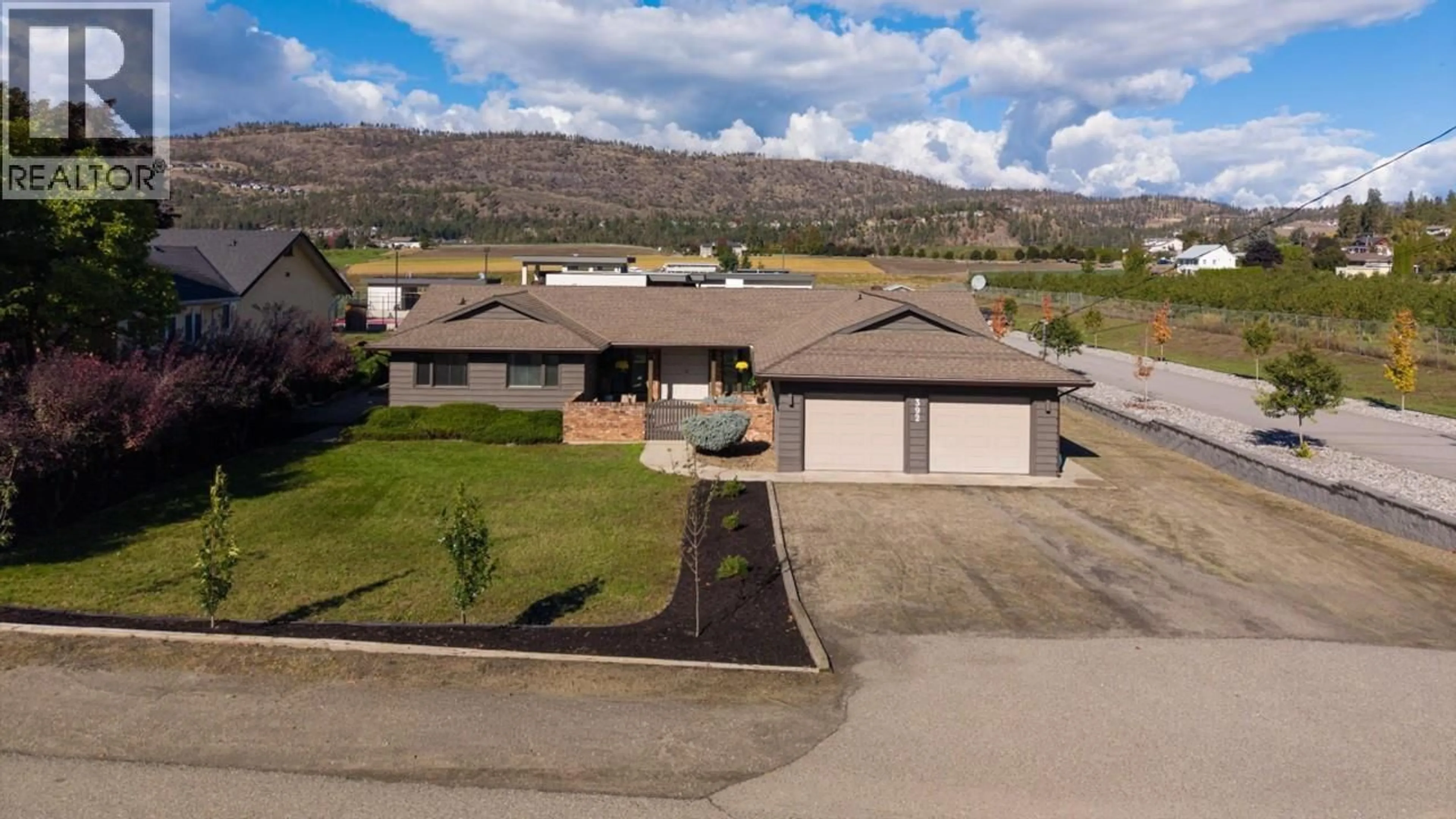 A pic from outside/outdoor area/front of a property/back of a property/a pic from drone, mountain view for 392 VALLEY ROAD NORTH, Kelowna British Columbia V1V2G1