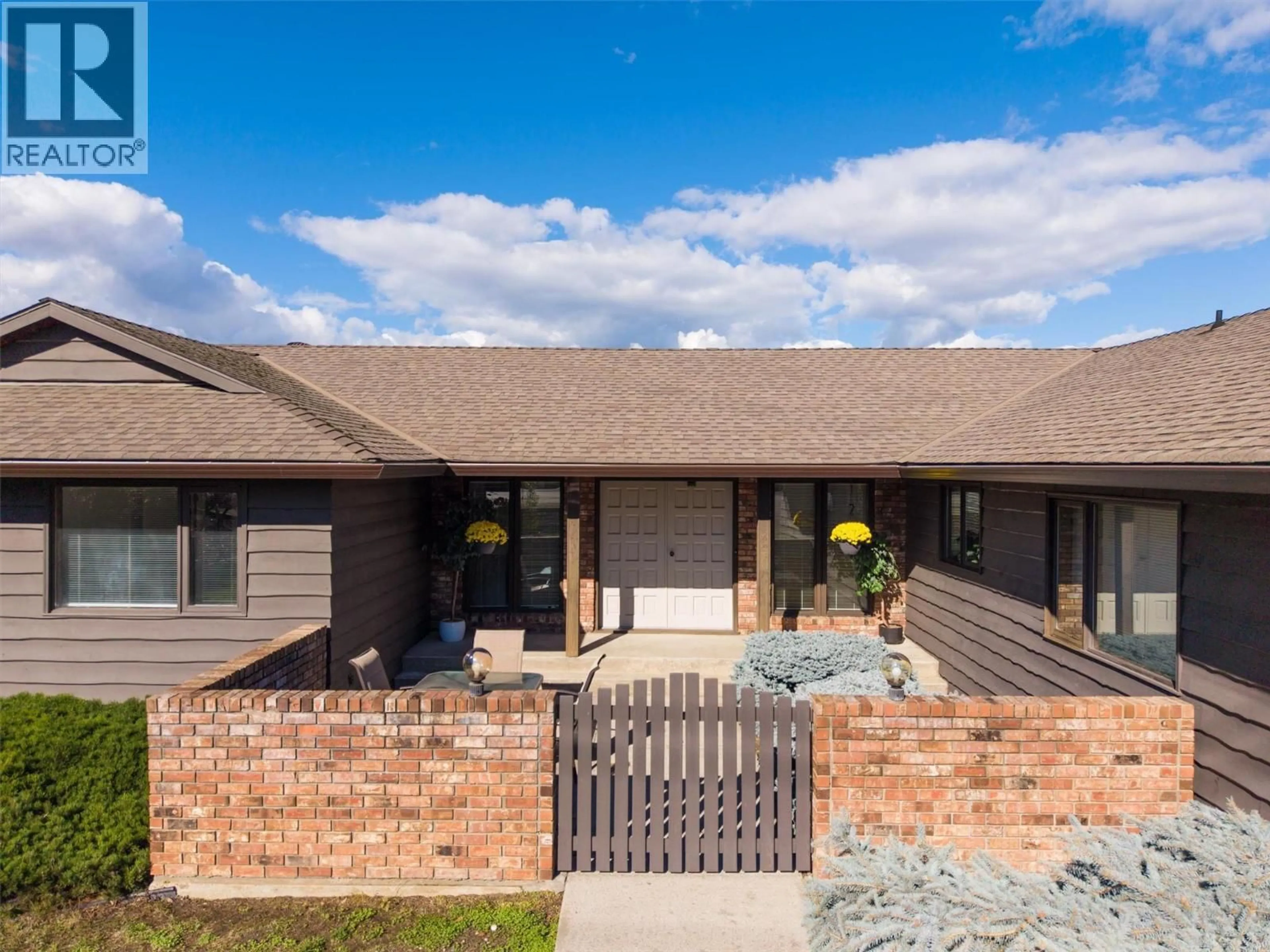 Home with brick exterior material, street for 392 VALLEY ROAD NORTH, Kelowna British Columbia V1V2G1