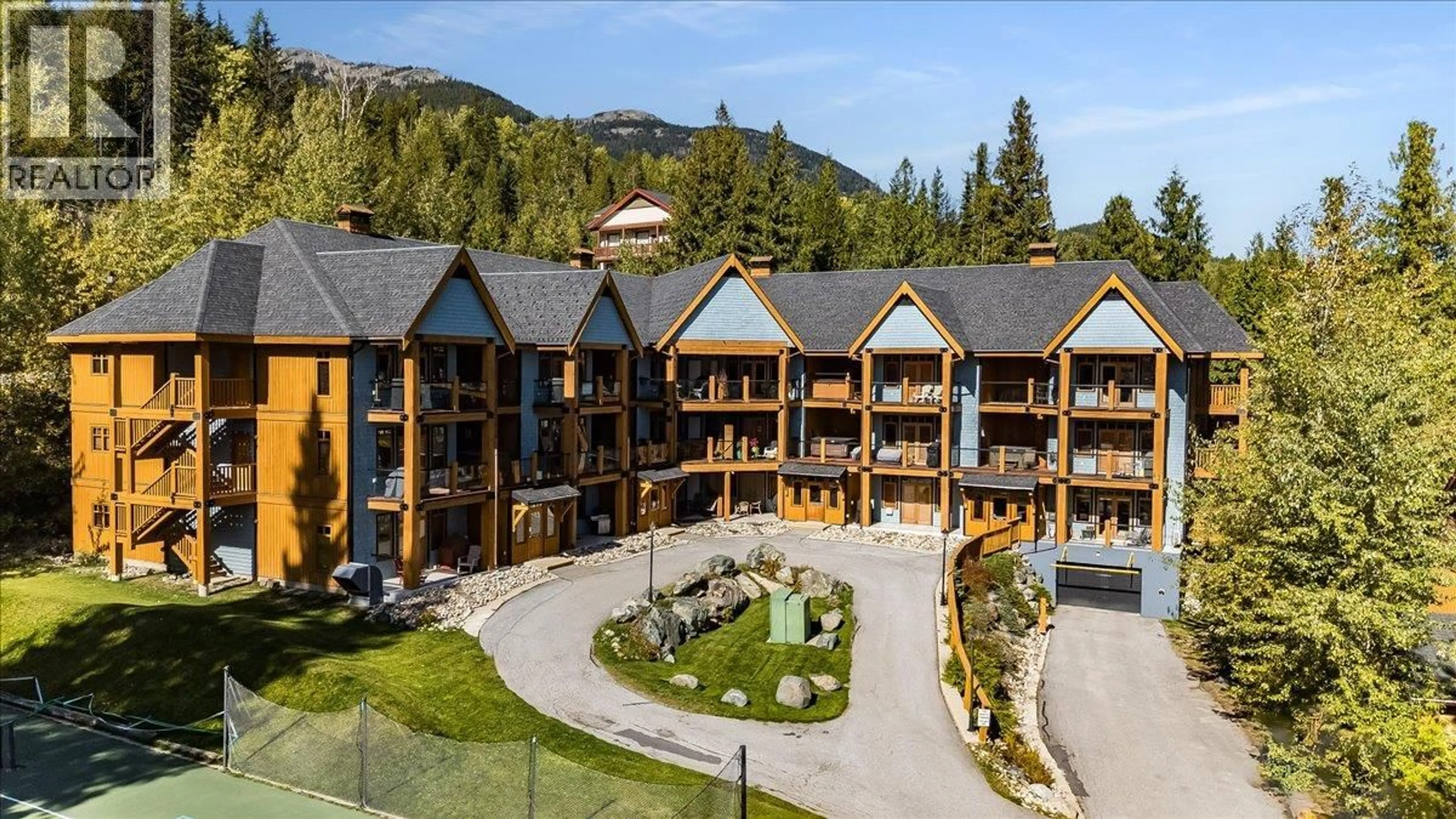 A pic from outside/outdoor area/front of a property/back of a property/a pic from drone, mountain view for 2 - 1008 OLAUS WAY, Rossland British Columbia V0G1Y0