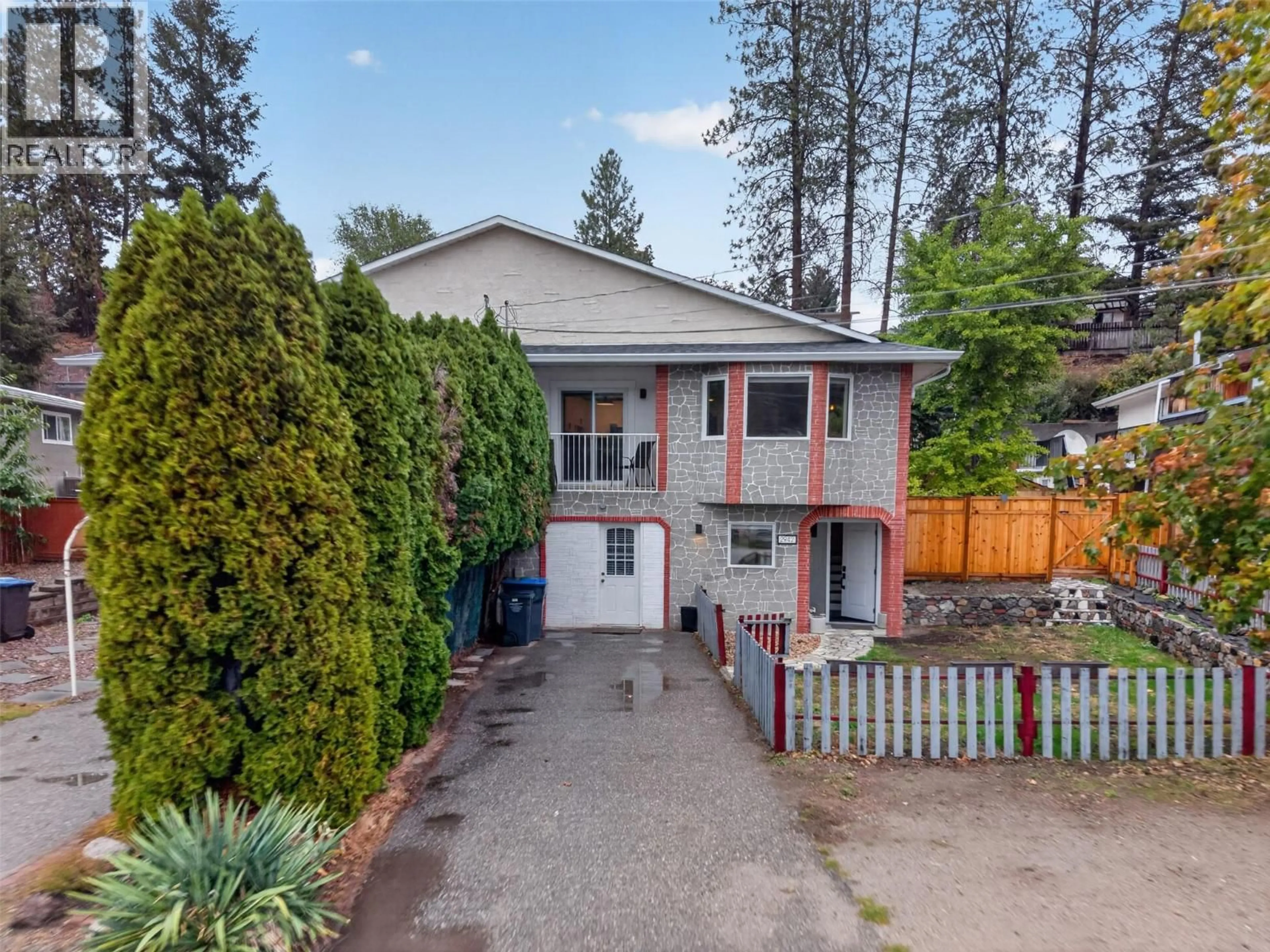 A pic from outside/outdoor area/front of a property/back of a property/a pic from drone, street for 2942 MCALLISTER ROAD, West Kelowna British Columbia V4T1G8