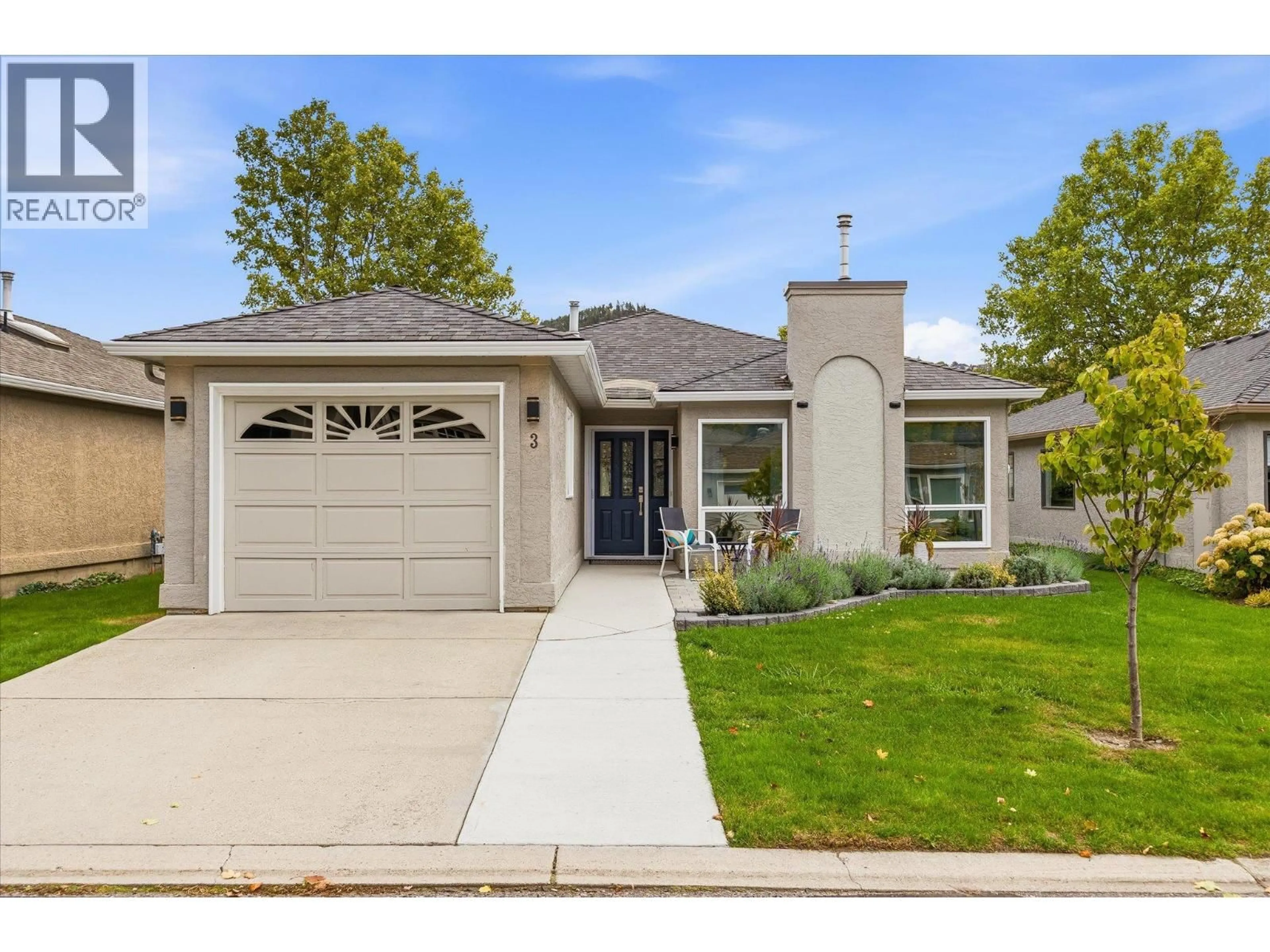Home with vinyl exterior material, street for 3 - 615 GLENMEADOWS ROAD, Kelowna British Columbia V1V1N9