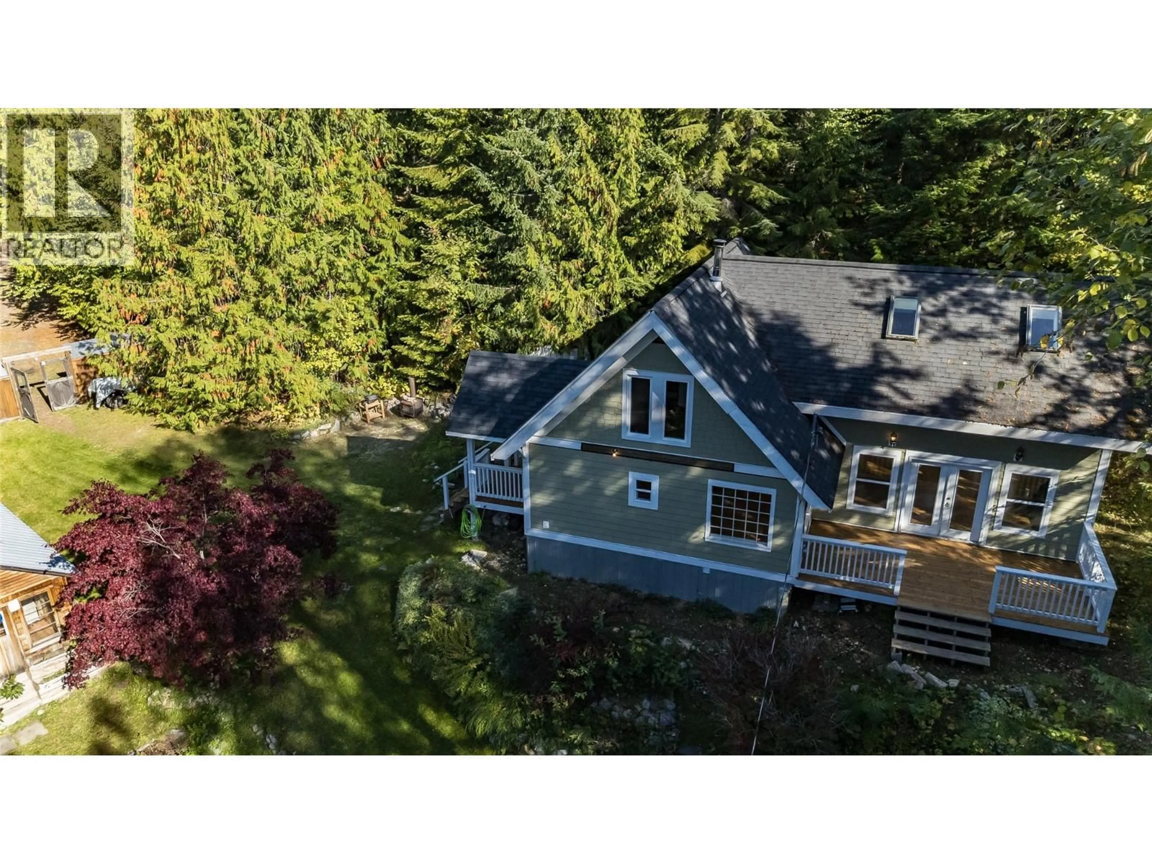 A pic from outside/outdoor area/front of a property/back of a property/a pic from drone, unknown for 215 RAINBOW RIDGE ROAD, Procter British Columbia V0G1V0
