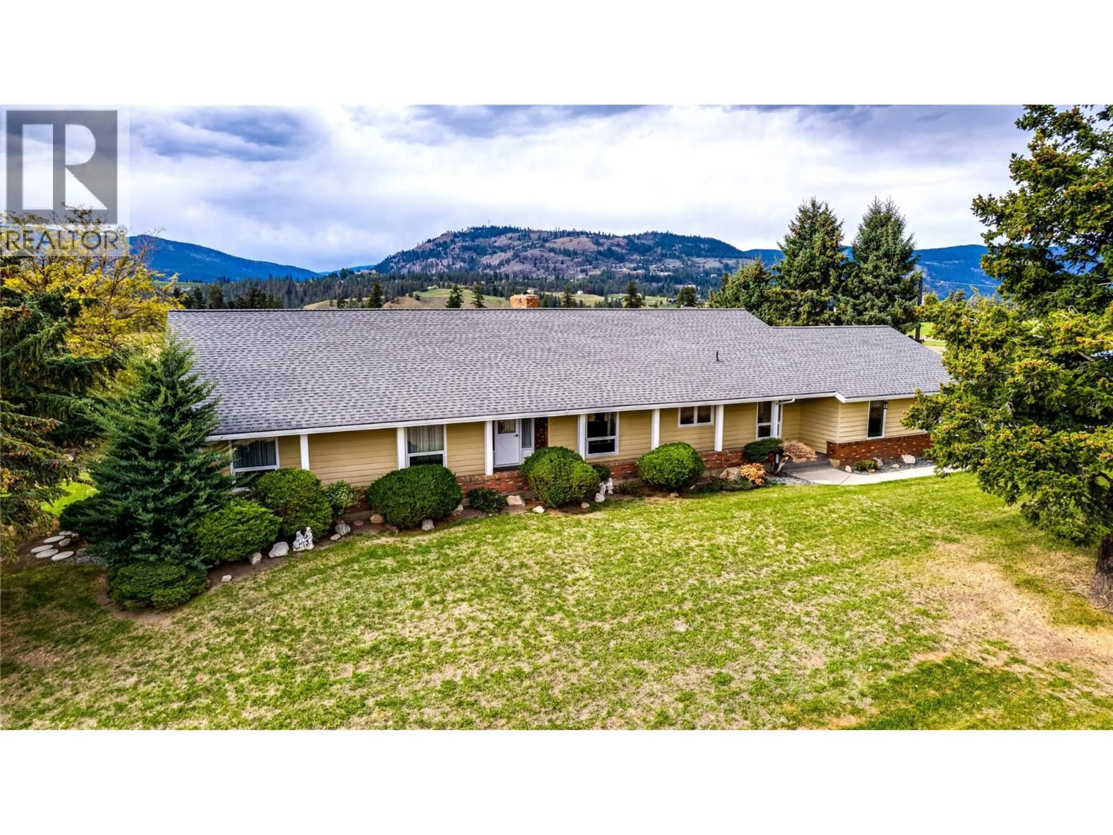 A pic from outside/outdoor area/front of a property/back of a property/a pic from drone, mountain view for 683 CLINTON ROAD, Spallumcheen British Columbia V4Y0P3