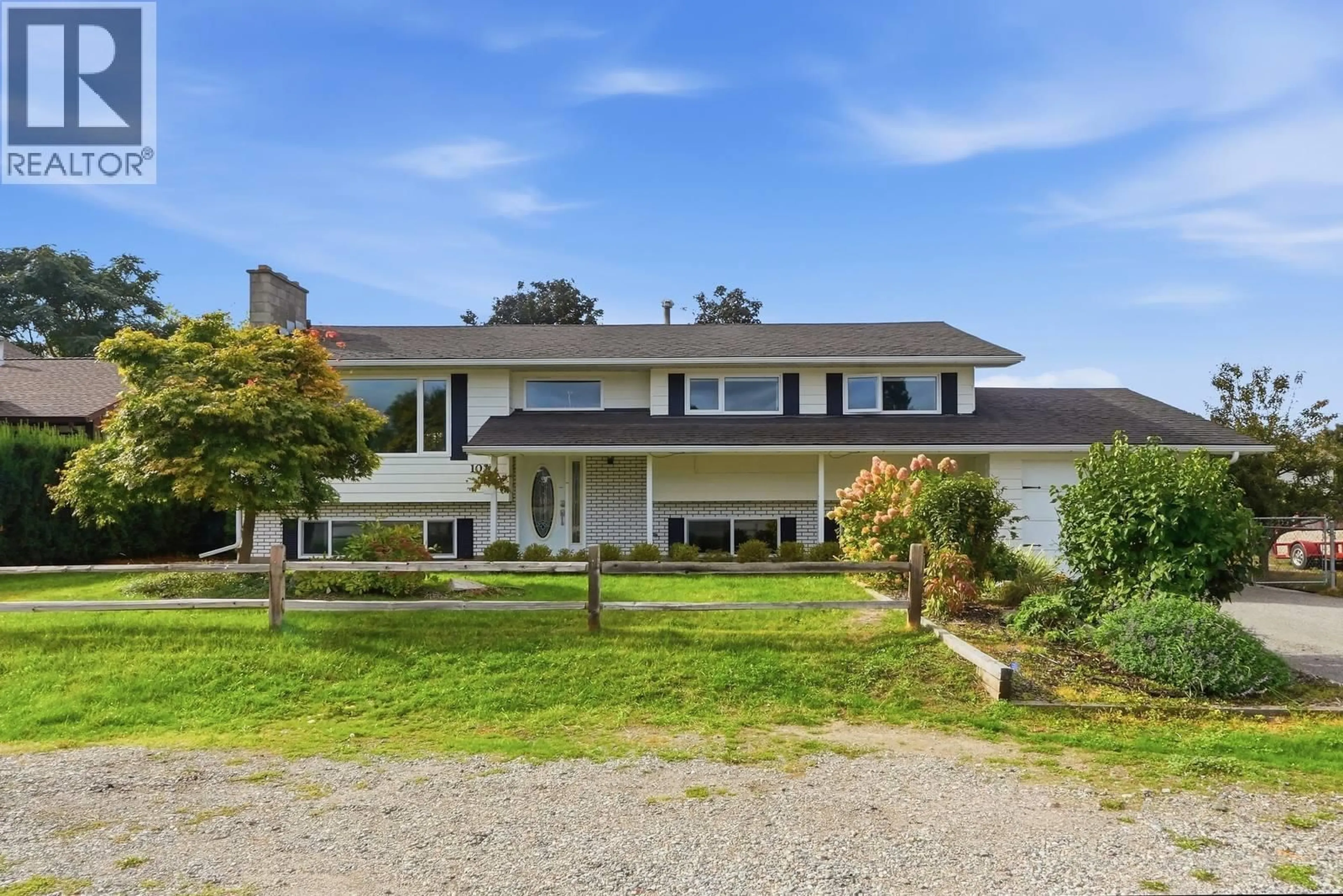 A pic from outside/outdoor area/front of a property/back of a property/a pic from drone, unknown for 1029 QUESNEL ROAD, Kelowna British Columbia V1Y3J4