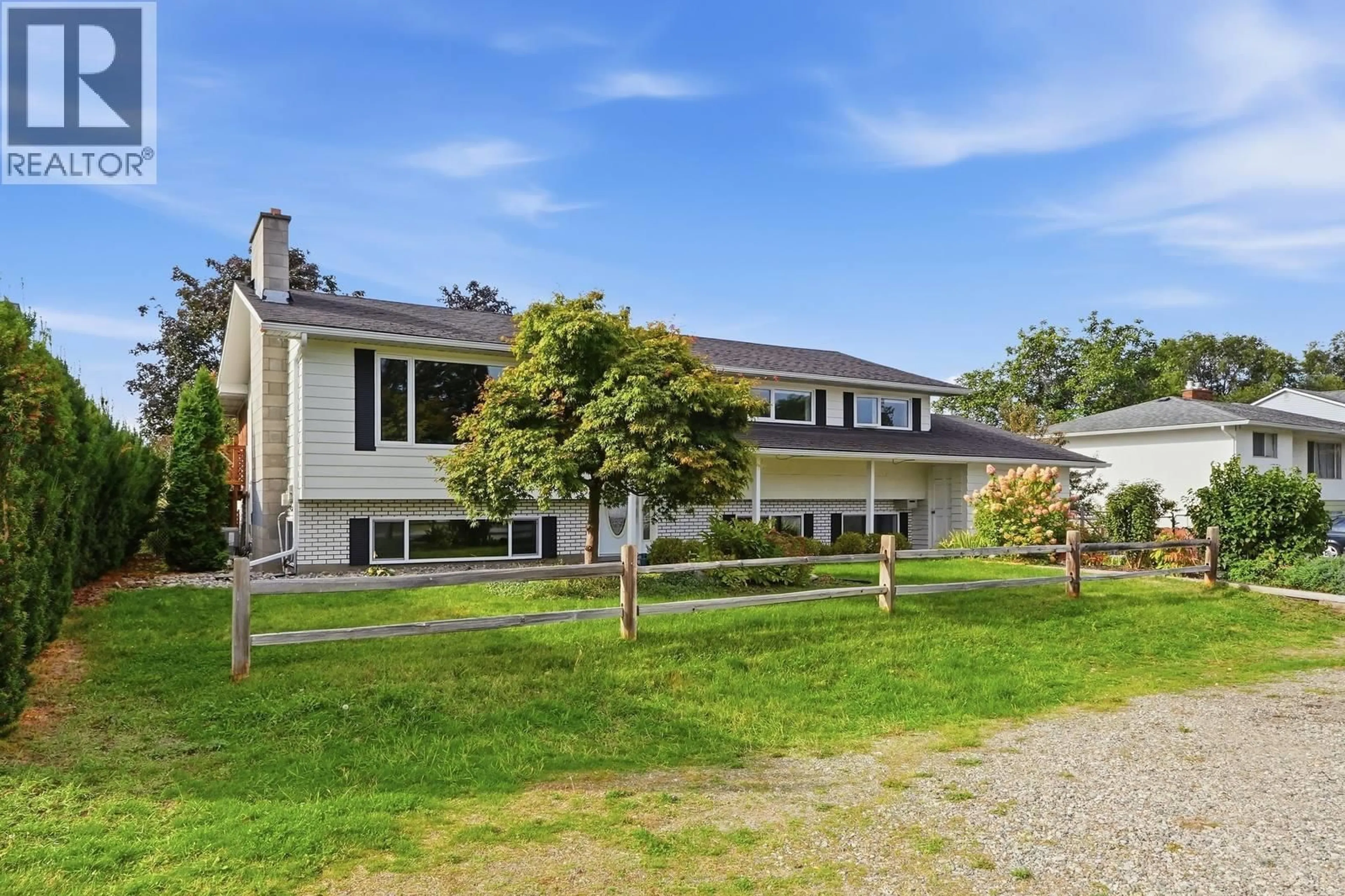 A pic from outside/outdoor area/front of a property/back of a property/a pic from drone, unknown for 1029 QUESNEL ROAD, Kelowna British Columbia V1Y3J4