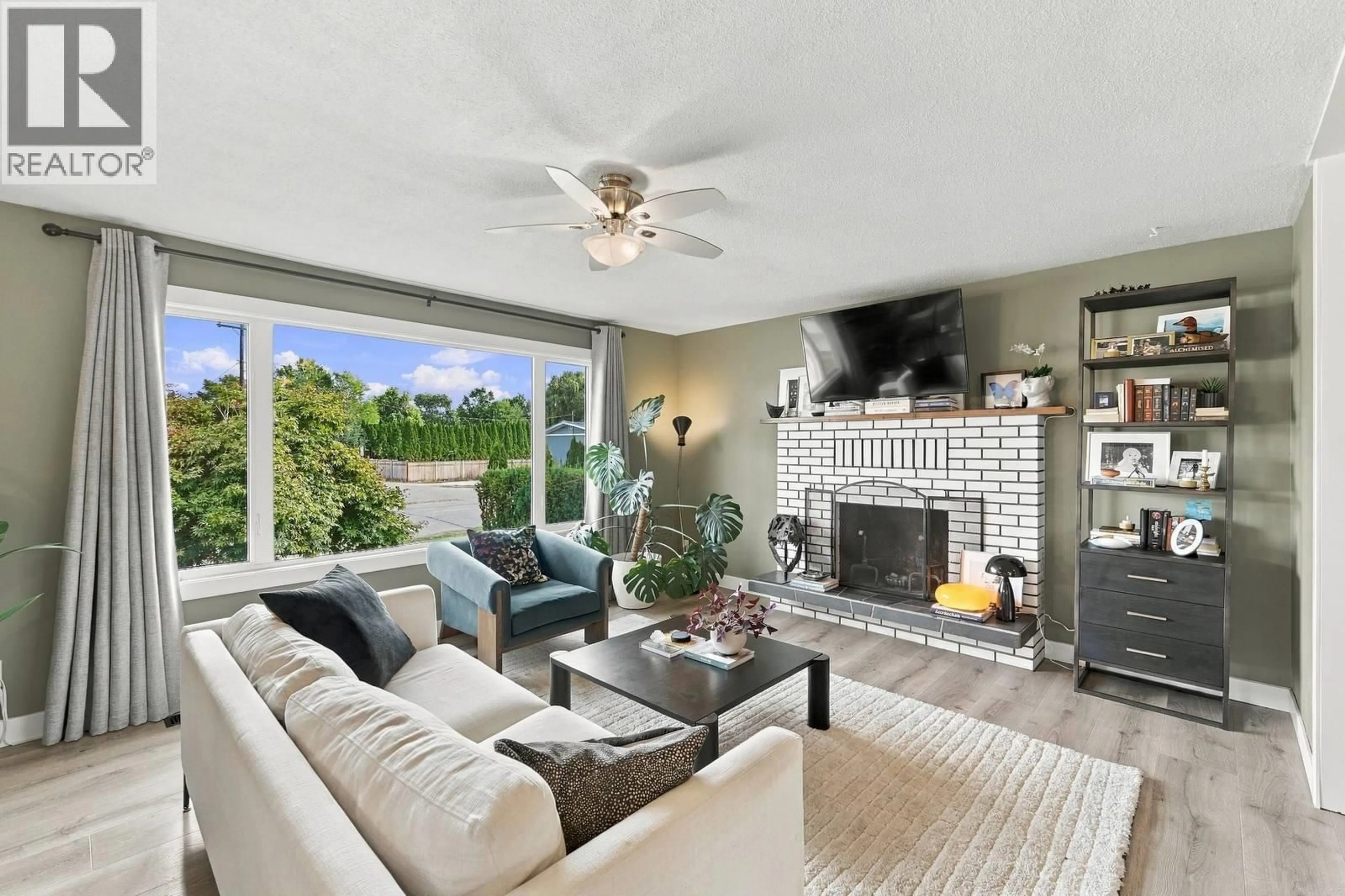 Living room with furniture, ceramic/tile floor for 1029 QUESNEL ROAD, Kelowna British Columbia V1Y3J4