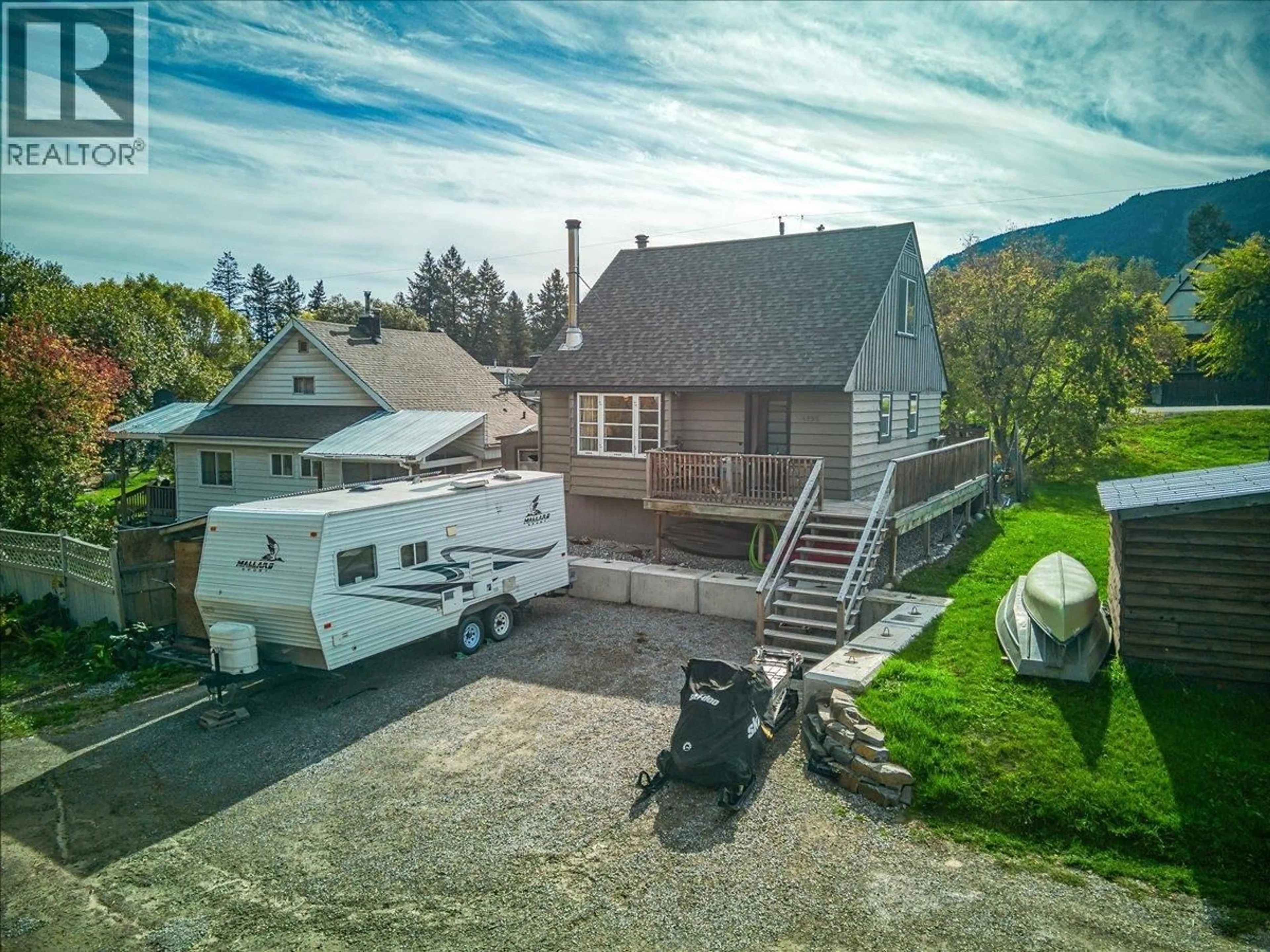 A pic from outside/outdoor area/front of a property/back of a property/a pic from drone, mountain view for 4895 SELKIRK AVENUE, Edgewater British Columbia V0A1E0