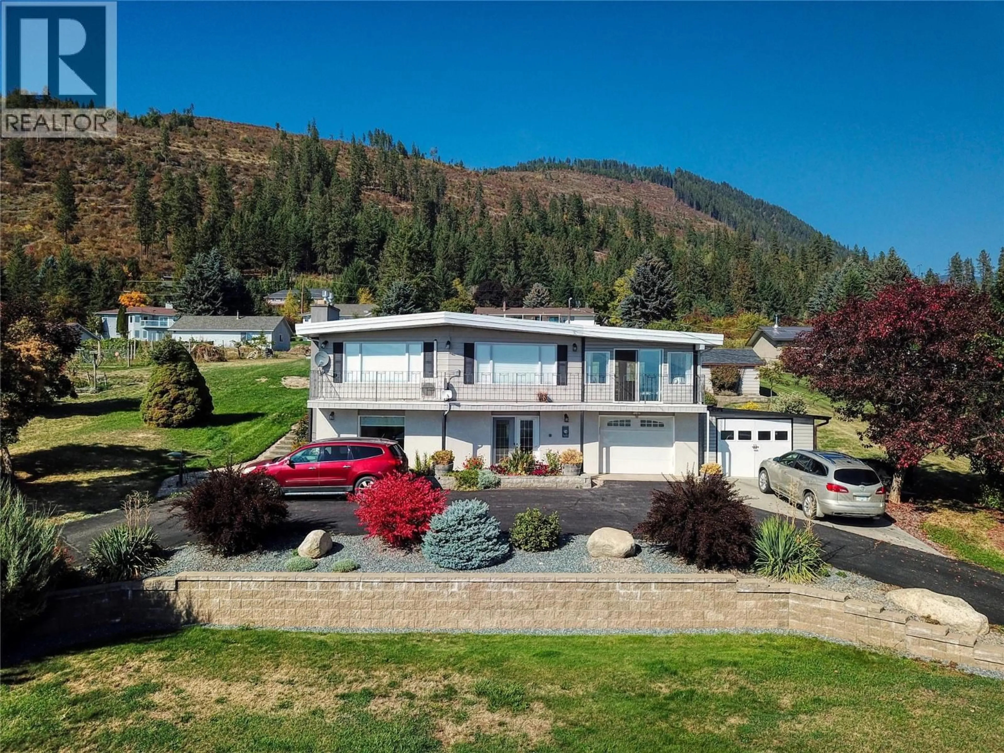 A pic from outside/outdoor area/front of a property/back of a property/a pic from drone, mountain view for 1030 MONROSE ROAD, Creston British Columbia V0B2N2