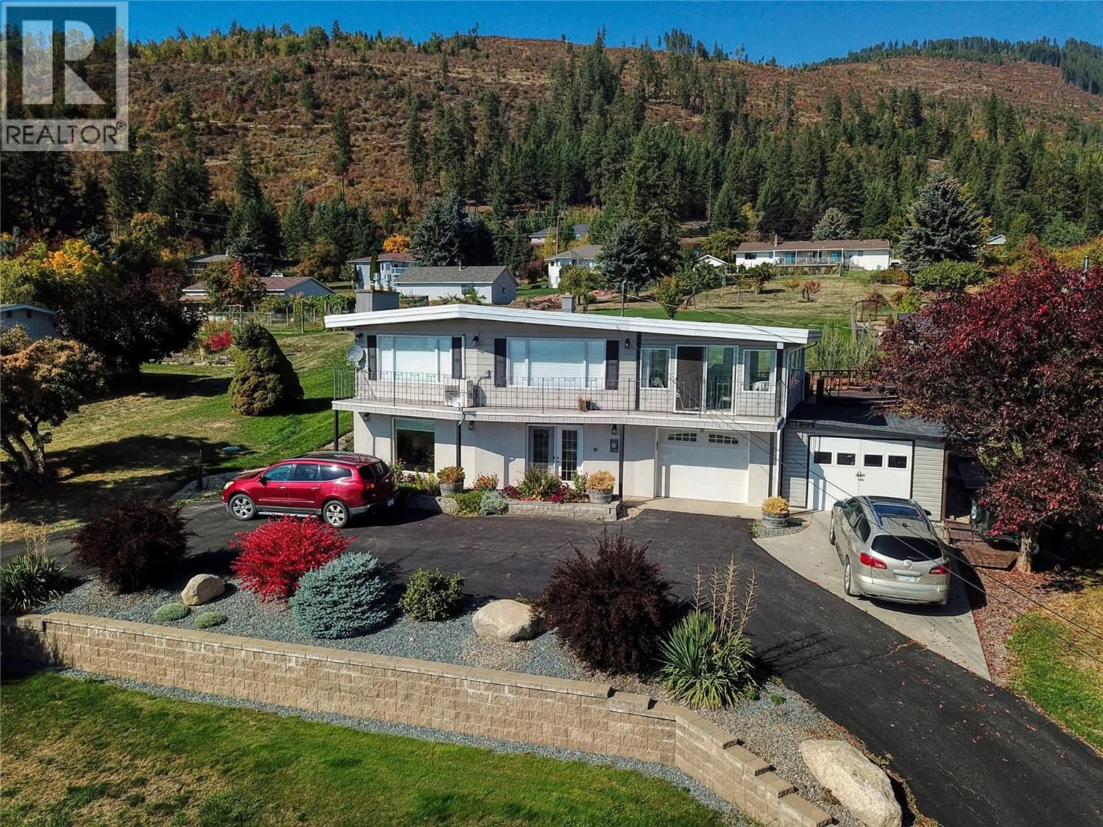 A pic from outside/outdoor area/front of a property/back of a property/a pic from drone, mountain view for 1030 MONROSE ROAD, Creston British Columbia V0B2N2