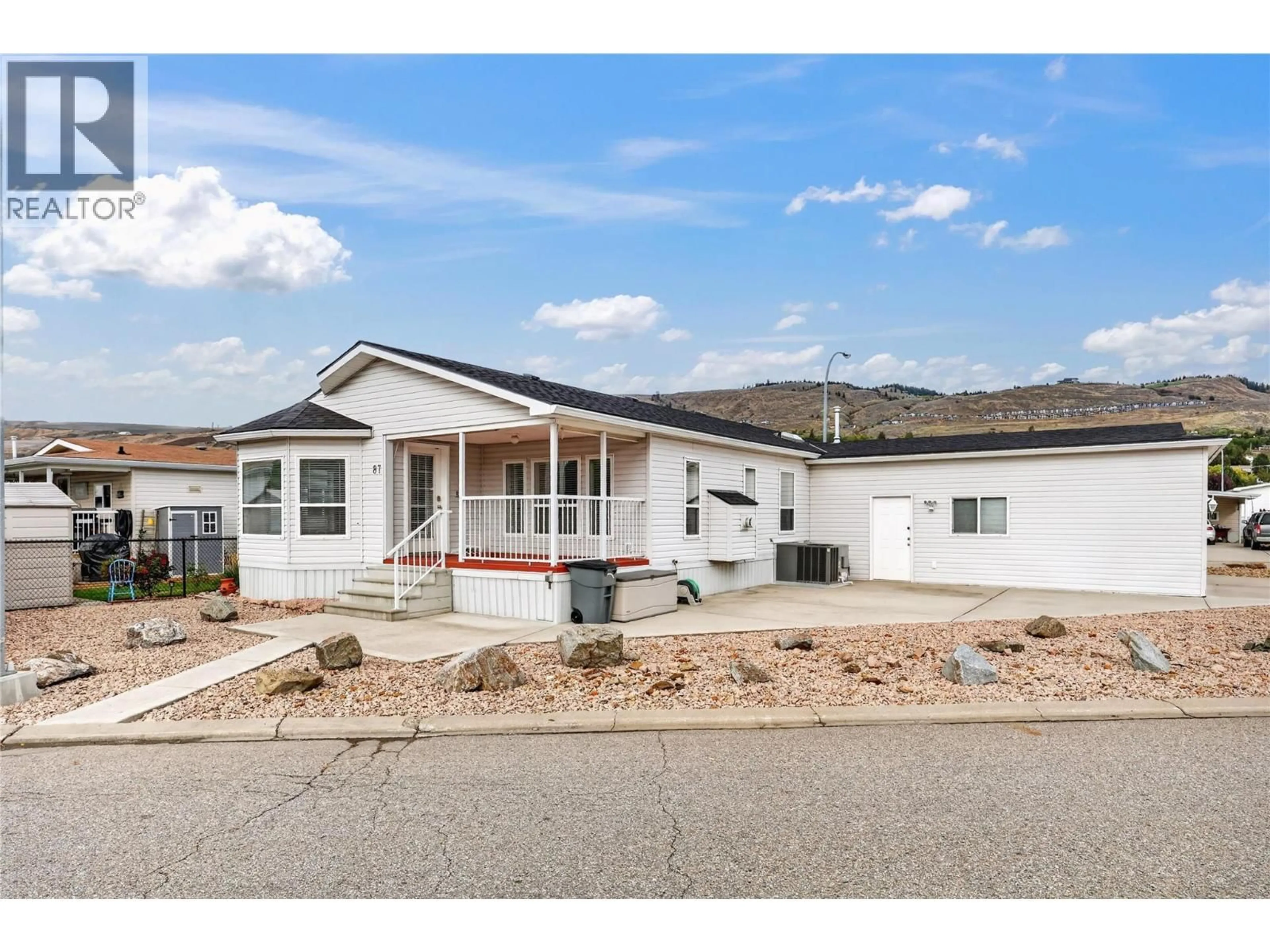 Home with vinyl exterior material, mountain view for 87 - 6688 TRONSON ROAD, Vernon British Columbia V1H1R9