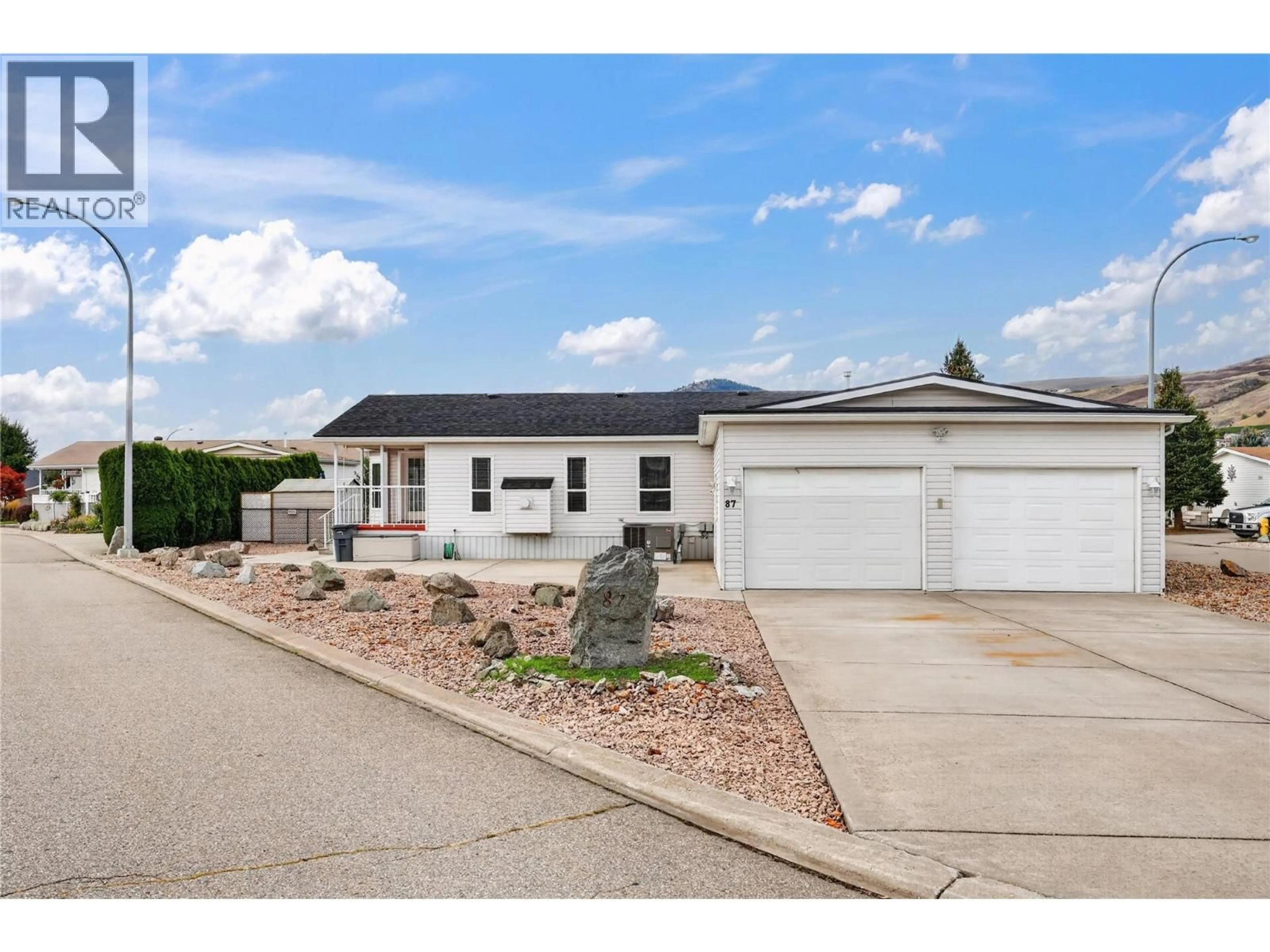 Home with vinyl exterior material, street for 87 - 6688 TRONSON ROAD, Vernon British Columbia V1H1R9