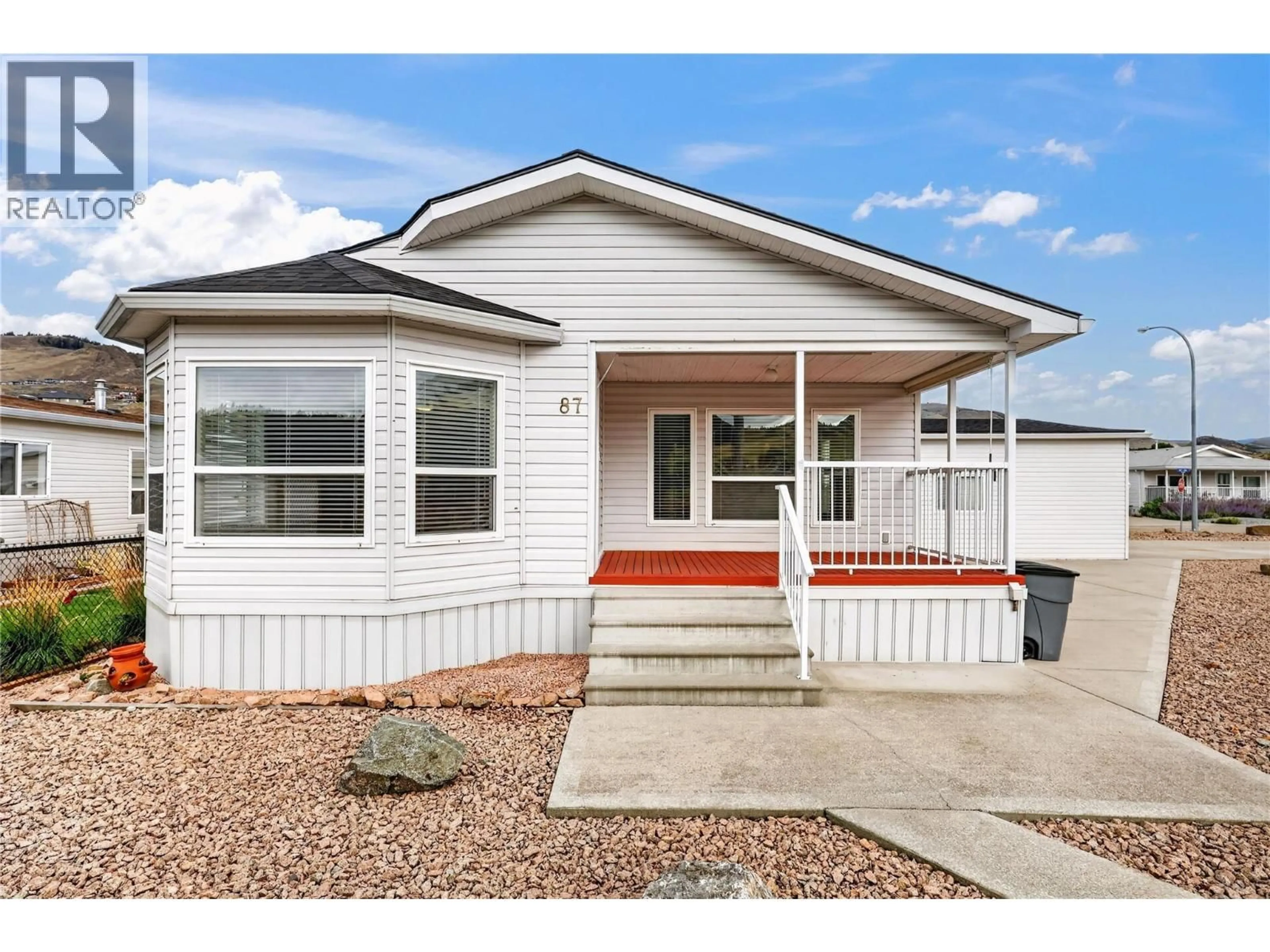 Home with vinyl exterior material, street for 87 - 6688 TRONSON ROAD, Vernon British Columbia V1H1R9