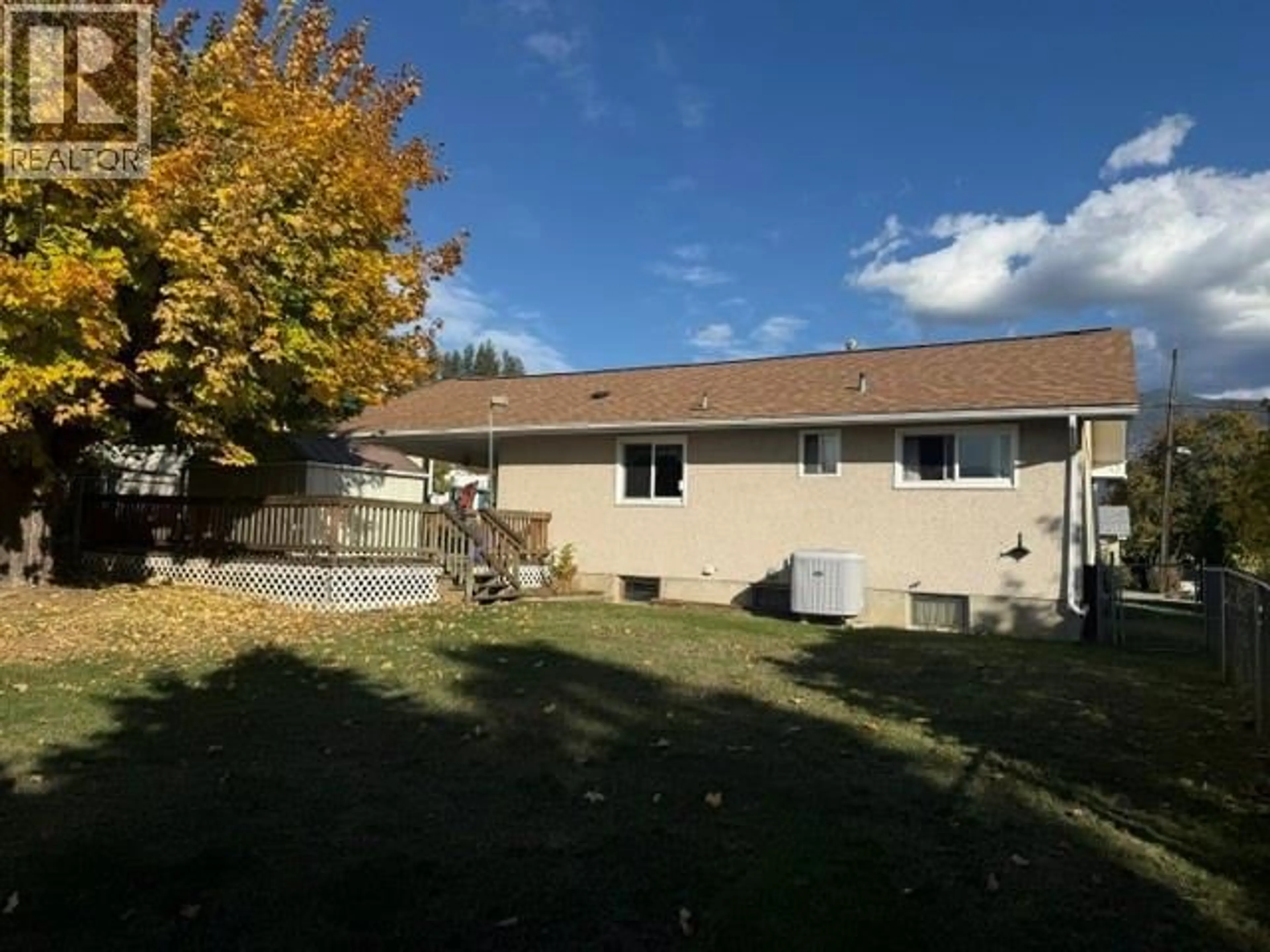 A pic from outside/outdoor area/front of a property/back of a property/a pic from drone, unknown for 221 22ND AVENUE SOUTH, Creston British Columbia V0B1G5