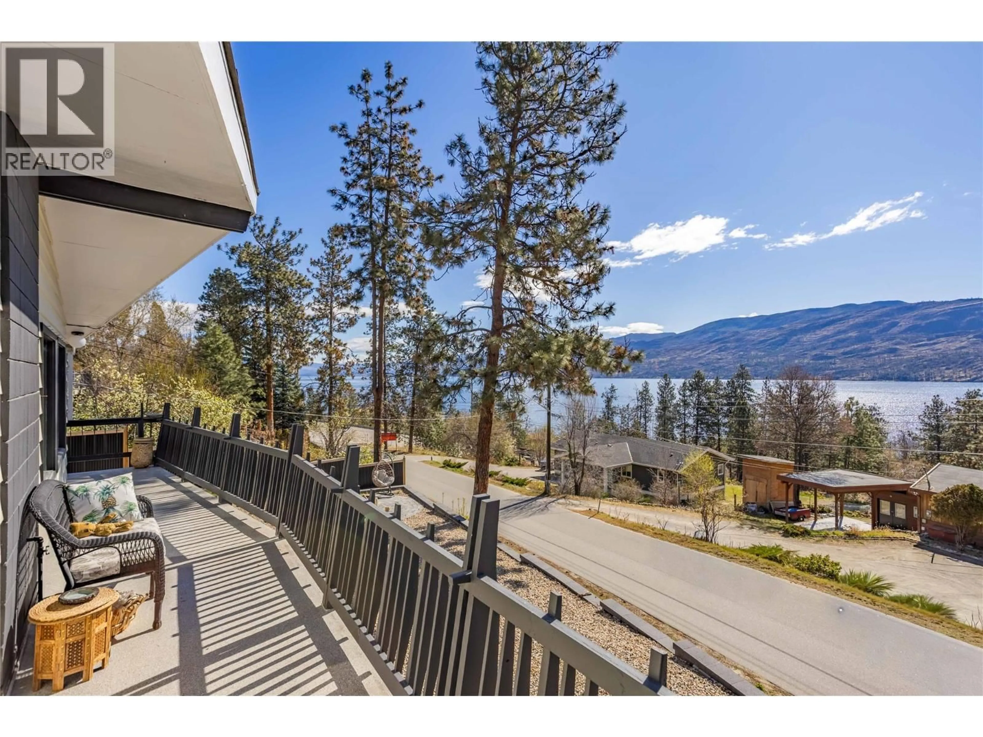 A pic from outside/outdoor area/front of a property/back of a property/a pic from drone, water/lake/river/ocean view for 3991 DESERT PINES AVENUE, Peachland British Columbia V0H1X2